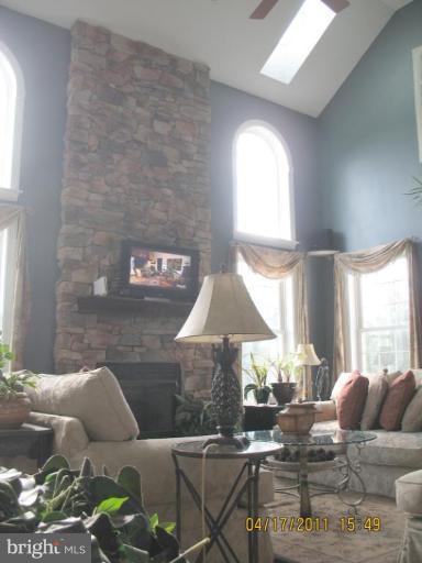 4721 East Basford Road Frederick, MD 21703 - Photo 23 of 28 a living room with furniture and a large window