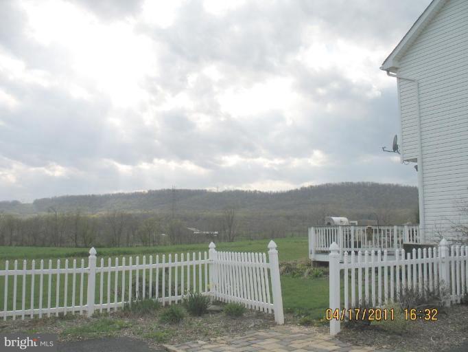 4721 East Basford Road Frederick, MD 21703 - Photo 25 of 28 a view of a house with a yard