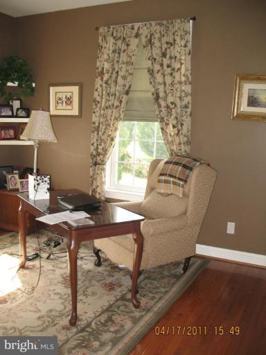 4721 East Basford Road Frederick, MD 21703 - Photo 26 of 28 a view of a workspace with furniture and a window