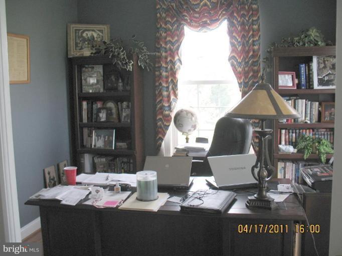 4721 East Basford Road Frederick, MD 21703 - Photo 27 of 28 a living room with furniture and a window