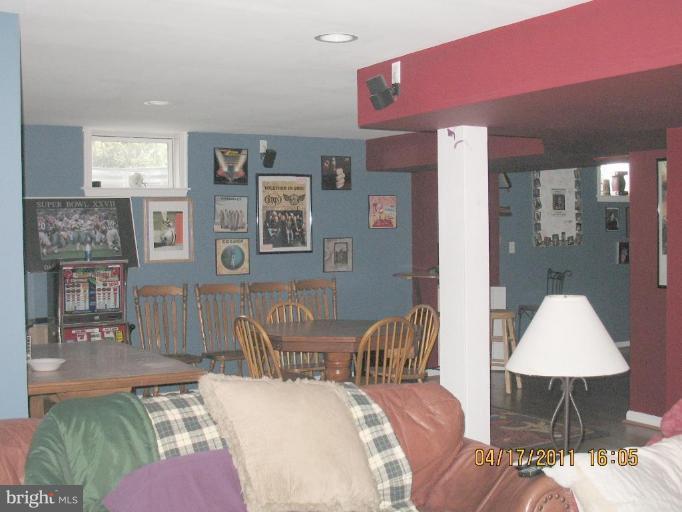 4721 East Basford Road Frederick, MD 21703 - Photo 9 of 28 a living room with furniture and wooden floor