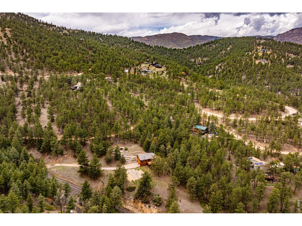 310 Wendelyn Way Boulder, CO 80302 - Photo 35 of 40 a view of a lush green hillside and houses