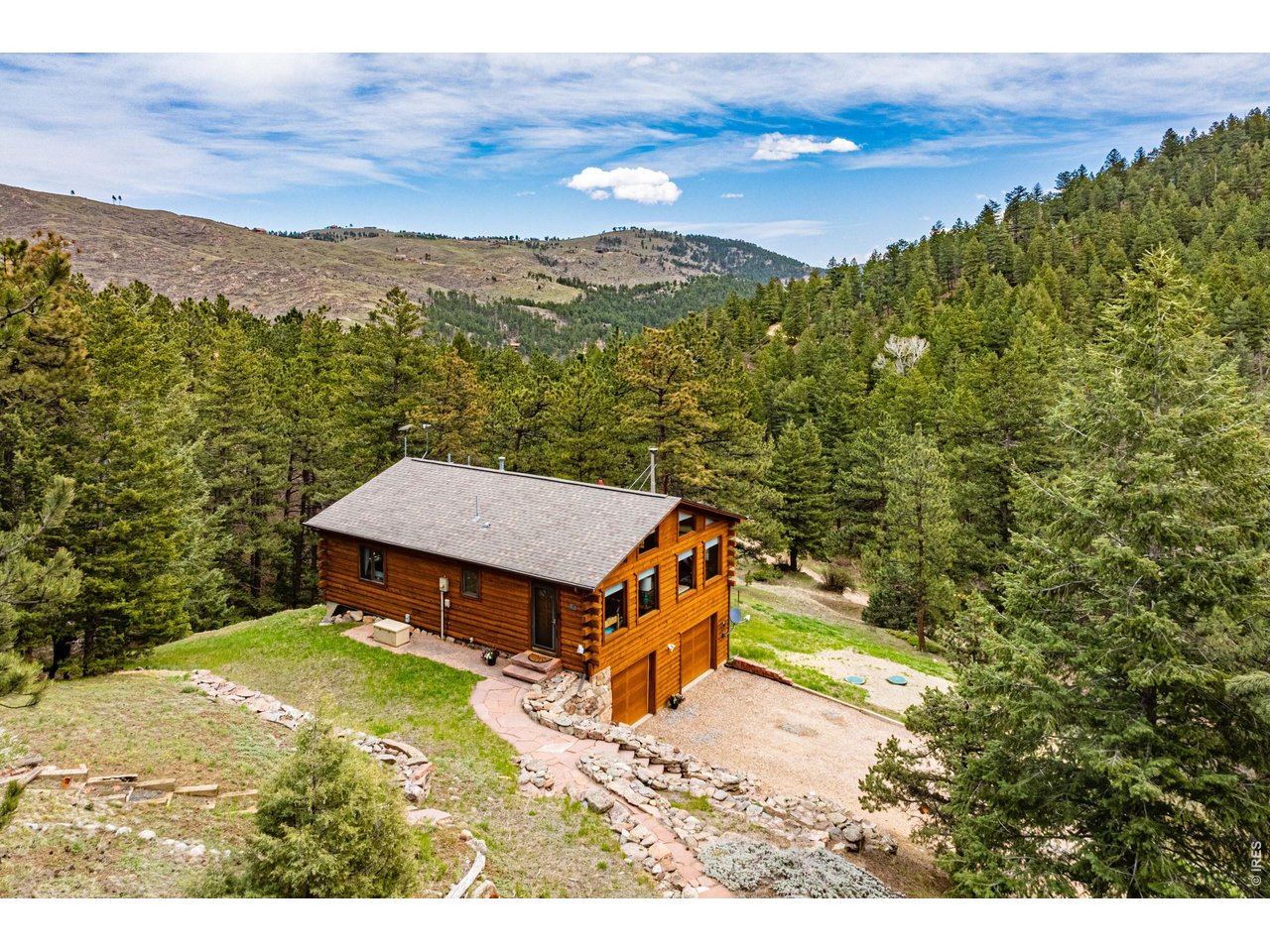 310 Wendelyn Way Boulder, CO 80302 - Photo 39 of 40 a view of a terrace with a garden and a mountain view