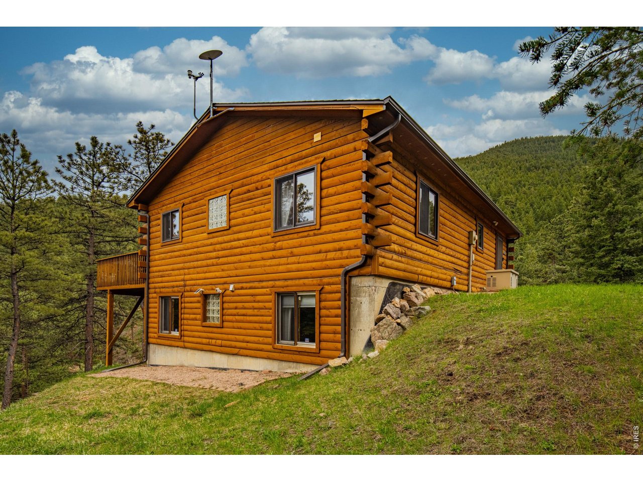 310 Wendelyn Way Boulder, CO 80302 - Photo 5 of 40 a front view of a house with a yard