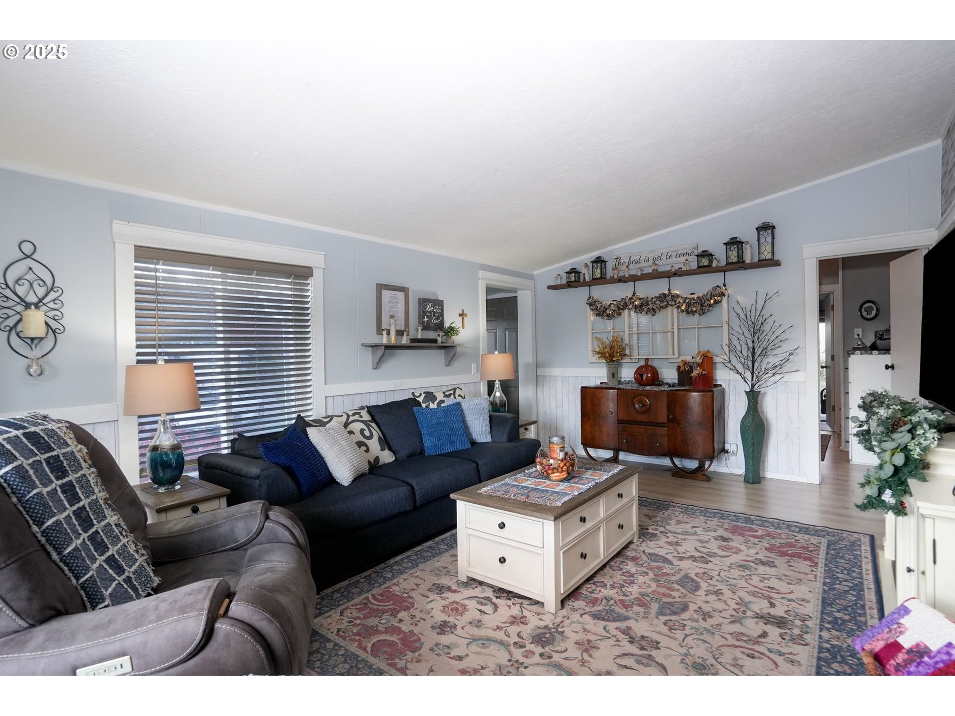 340 Northeast Crest Street, Unit 71 Sublimity, OR 97385 - Photo 13 of 33 a living room with furniture and a large window