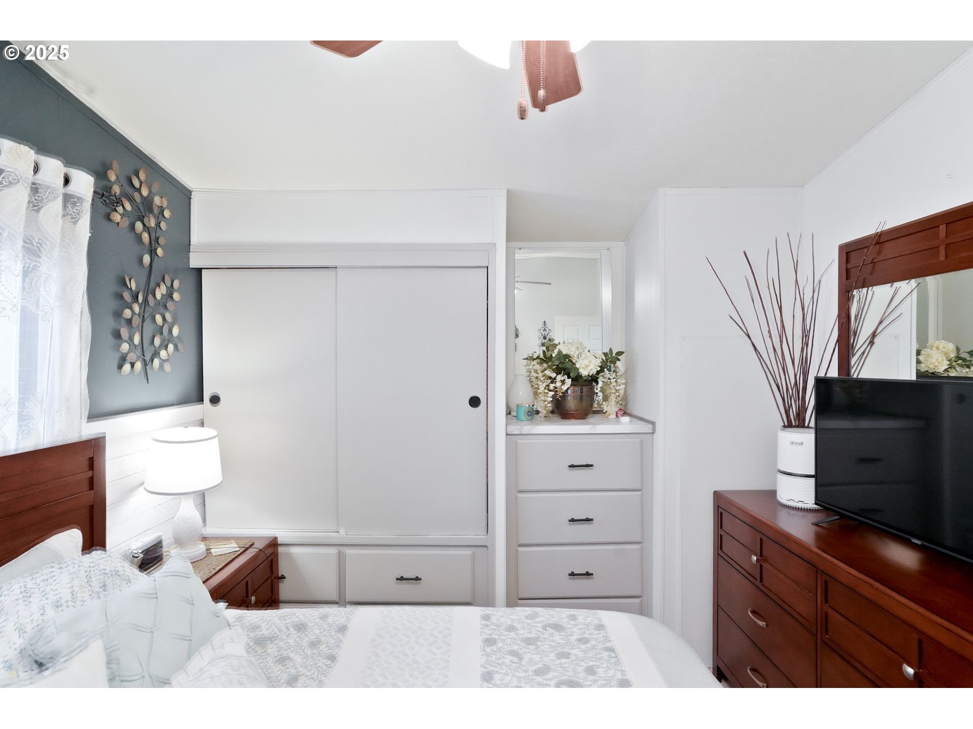 340 Northeast Crest Street, Unit 71 Sublimity, OR 97385 - Photo 20 of 33 a living room with furniture and a flat screen tv