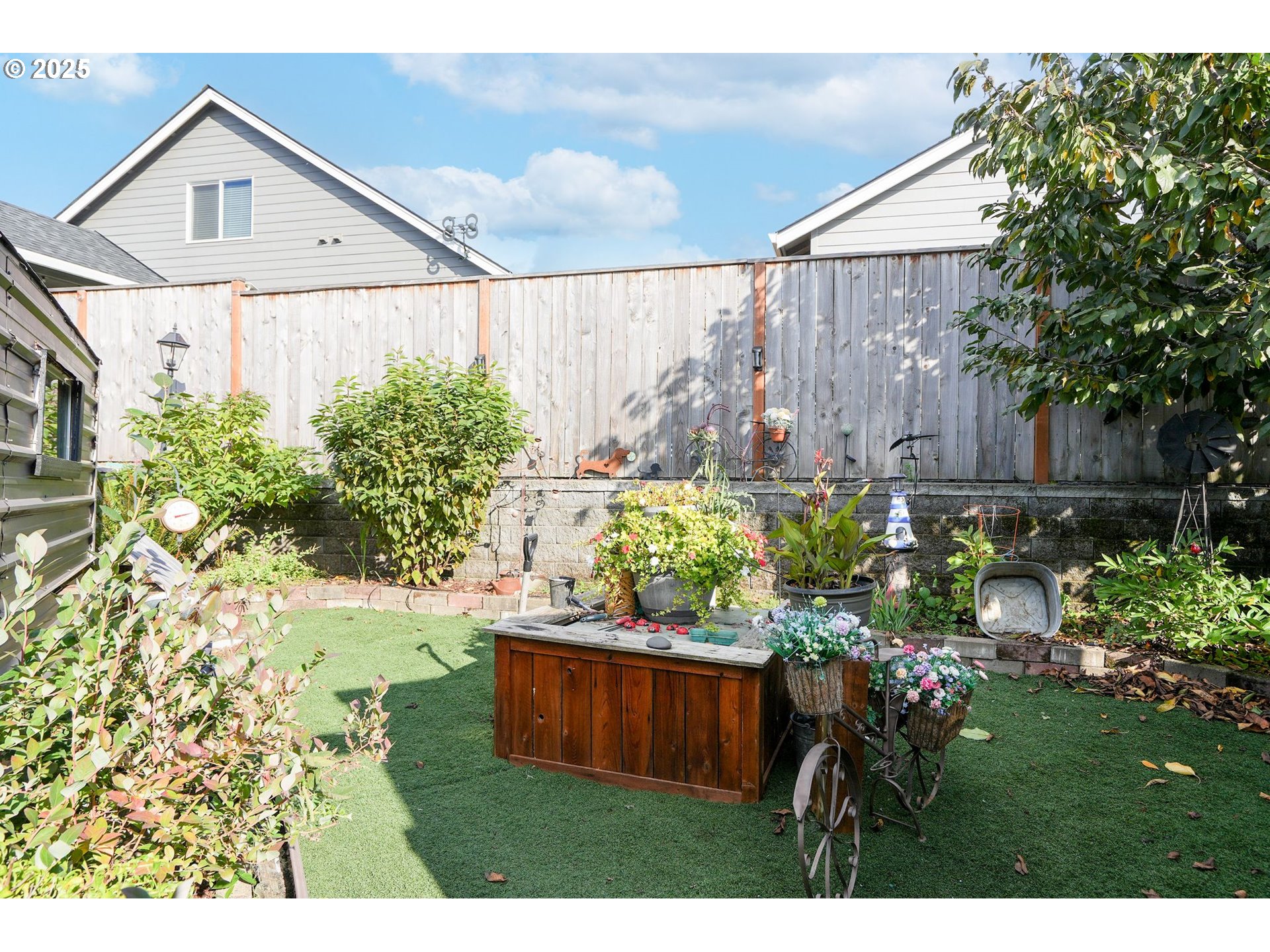 340 Northeast Crest Street, Unit 71 Sublimity, OR 97385 - Photo 32 of 33 a view of a backyard with plants