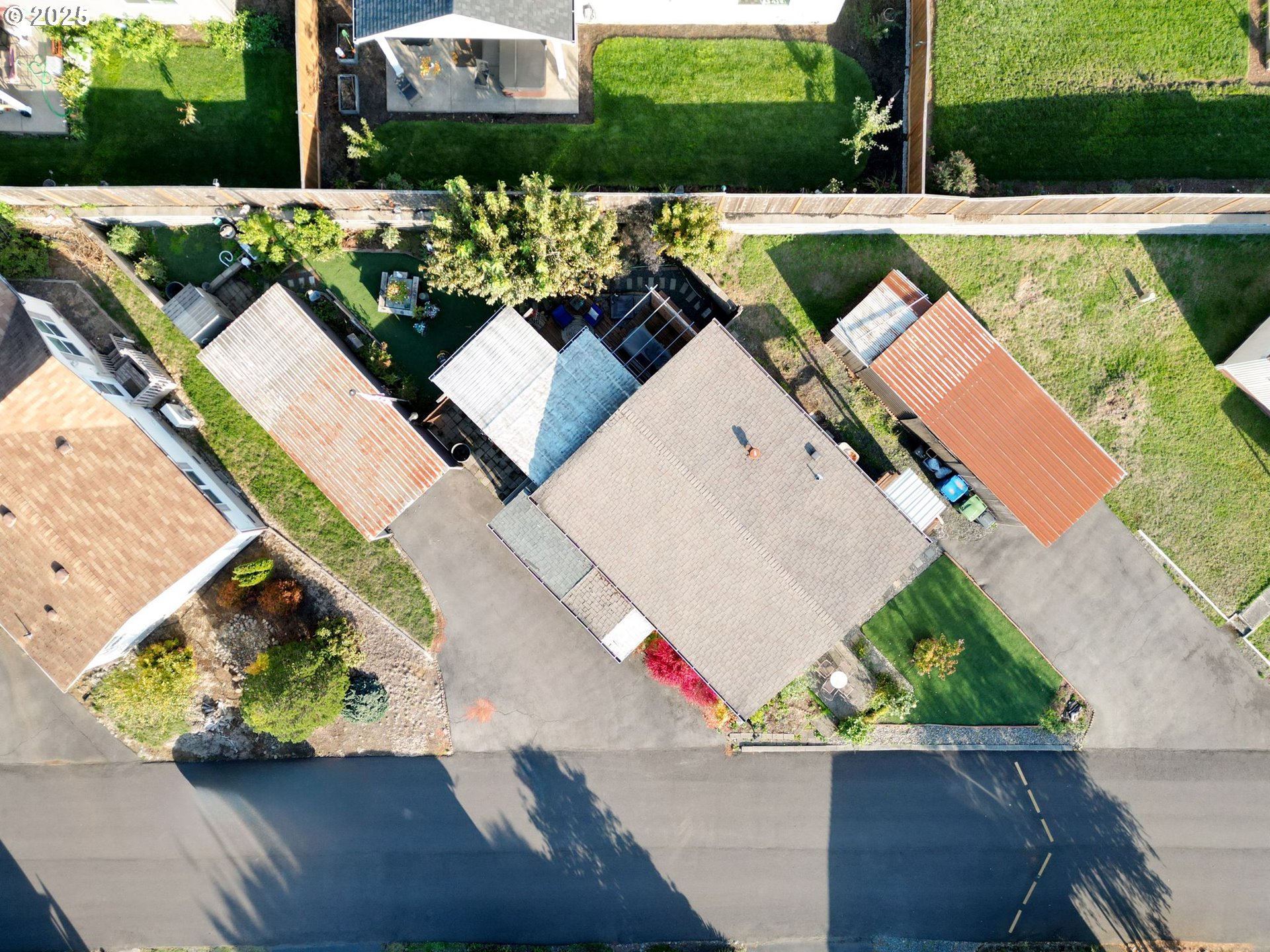 340 Northeast Crest Street, Unit 71 Sublimity, OR 97385 - Photo 4 of 33 a view of yard from outdoor seating