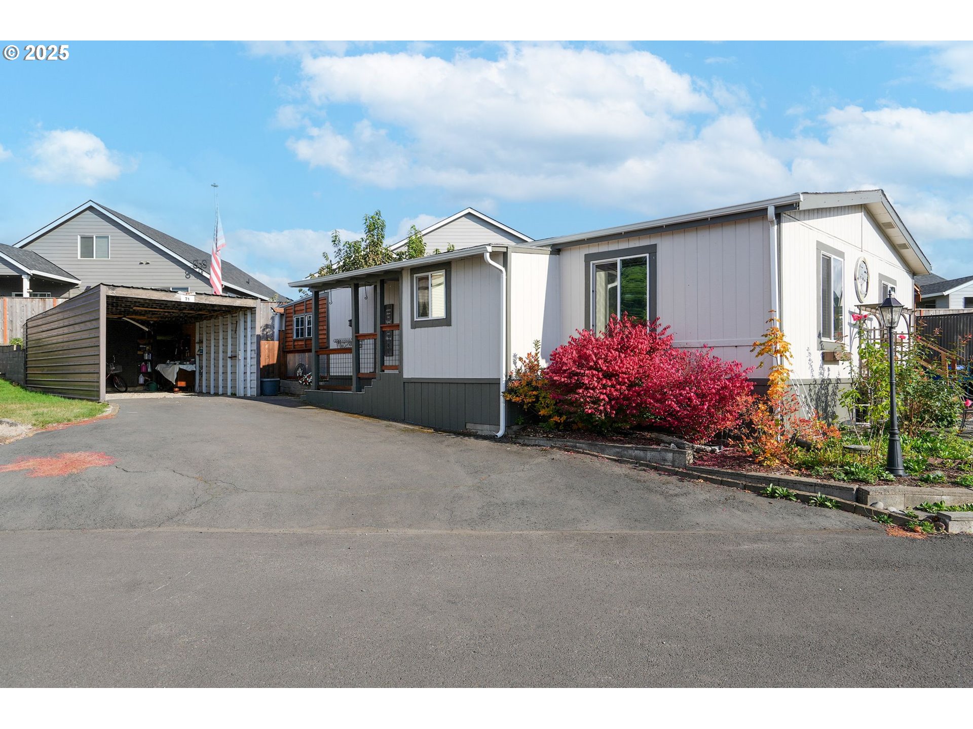 340 Northeast Crest Street, Unit 71 Sublimity, OR 97385 - Photo 5 of 33 a view of a house with a yard