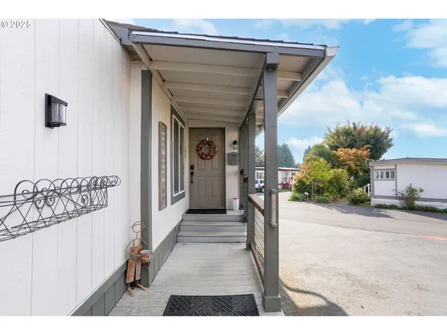 a view of a house with a street