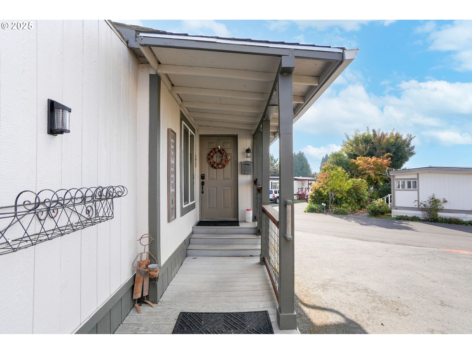 340 Northeast Crest Street, Unit 71 Sublimity, OR 97385 - Photo 10 of 33 a view of a house with a street