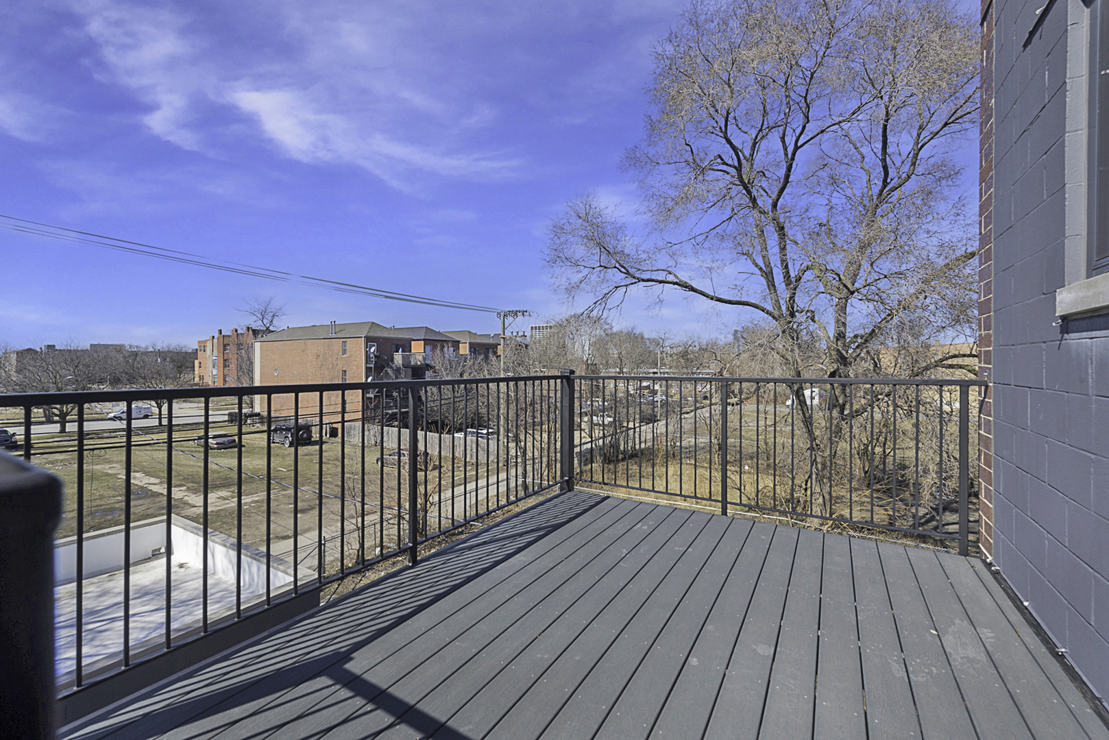3762 South Indiana Avenue Chicago, IL 60653 - Photo 2 of 27 a view of balcony with wooden floor