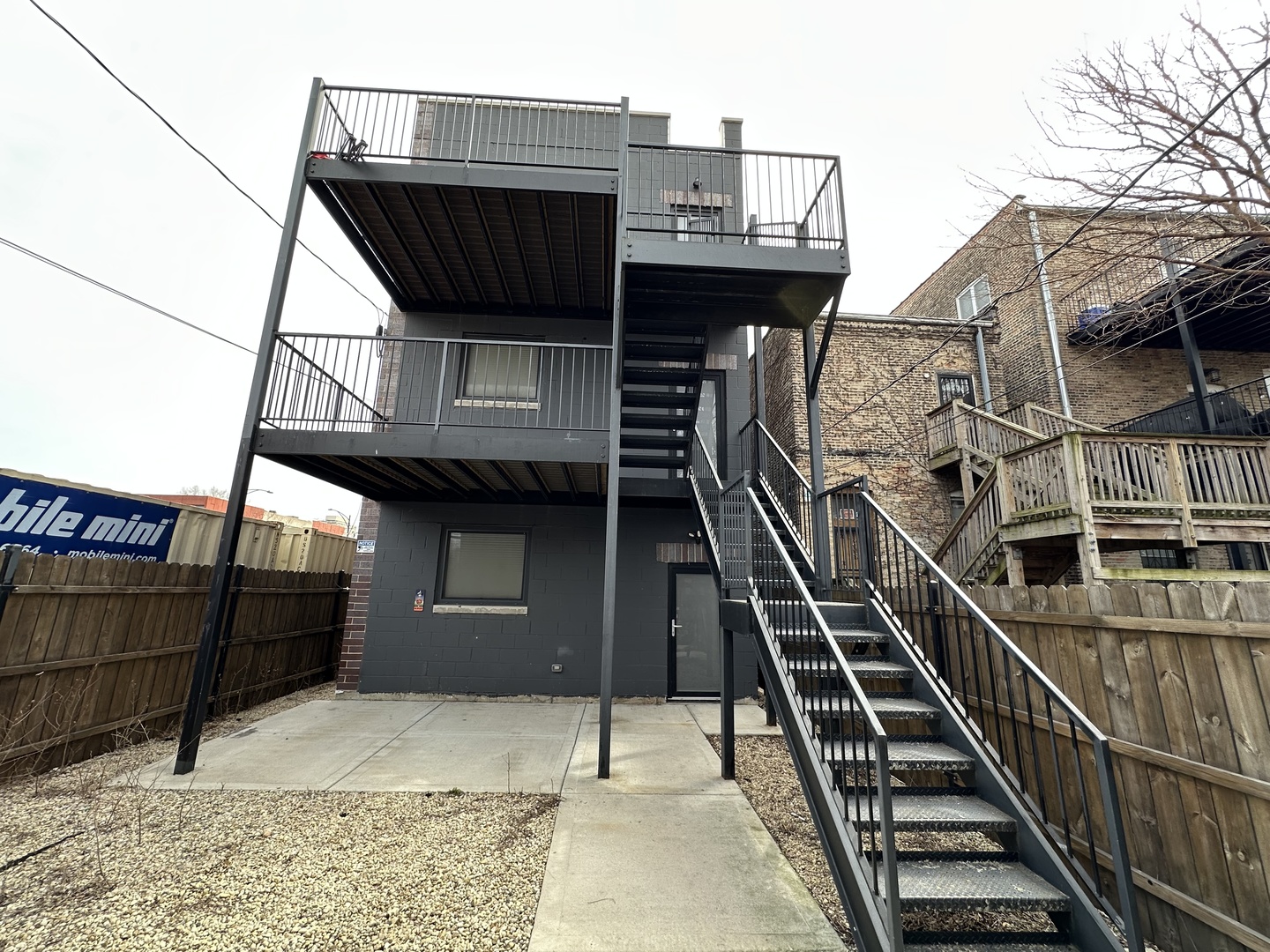3762 South Indiana Avenue Chicago, IL 60653 - Photo 26 of 27 a view of a balcony with wooden floor