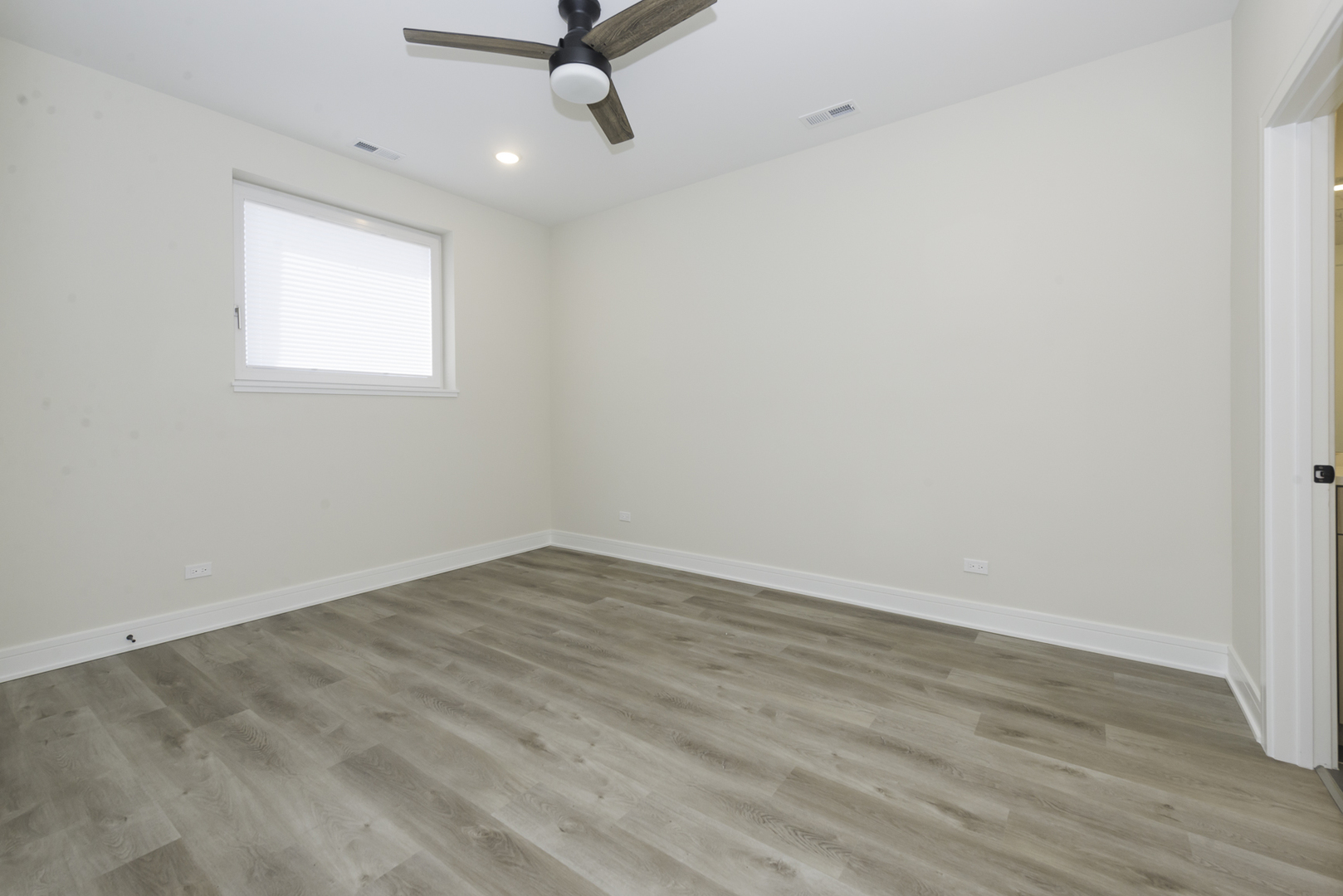3762 South Indiana Avenue Chicago, IL 60653 - Photo 10 of 27 wooden floor in an empty room