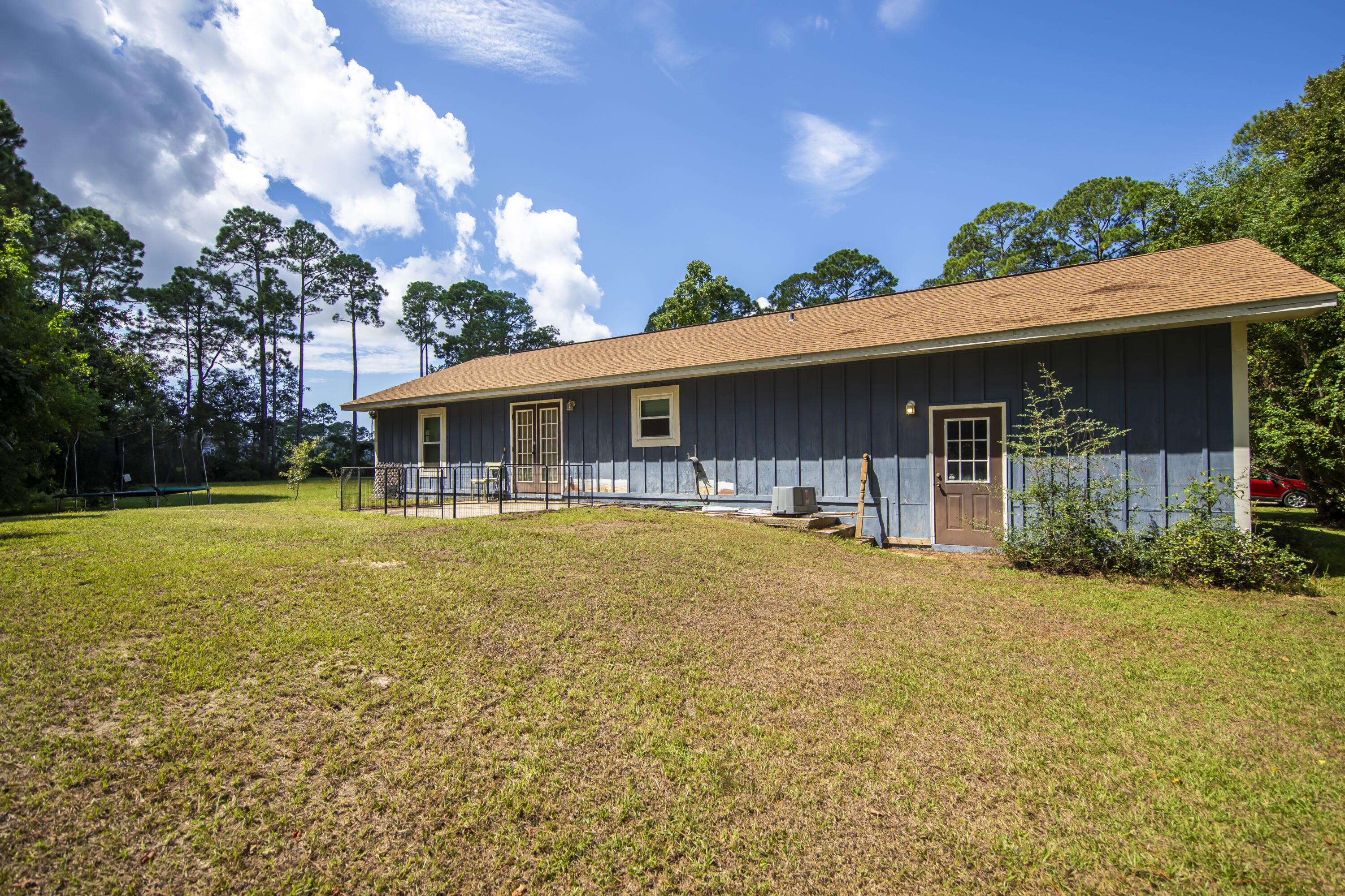 601 Chat Holley Road Santa Rosa Beach, FL 32459 - Photo 24 of 32 a view of house with swimming pool outdoor seating