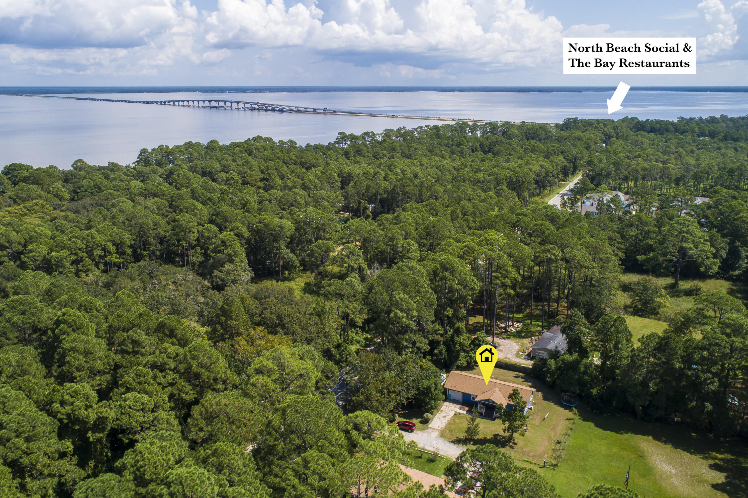 601 Chat Holley Road Santa Rosa Beach, FL 32459 - Photo 30 of 32 a aerial view of a house with a yard