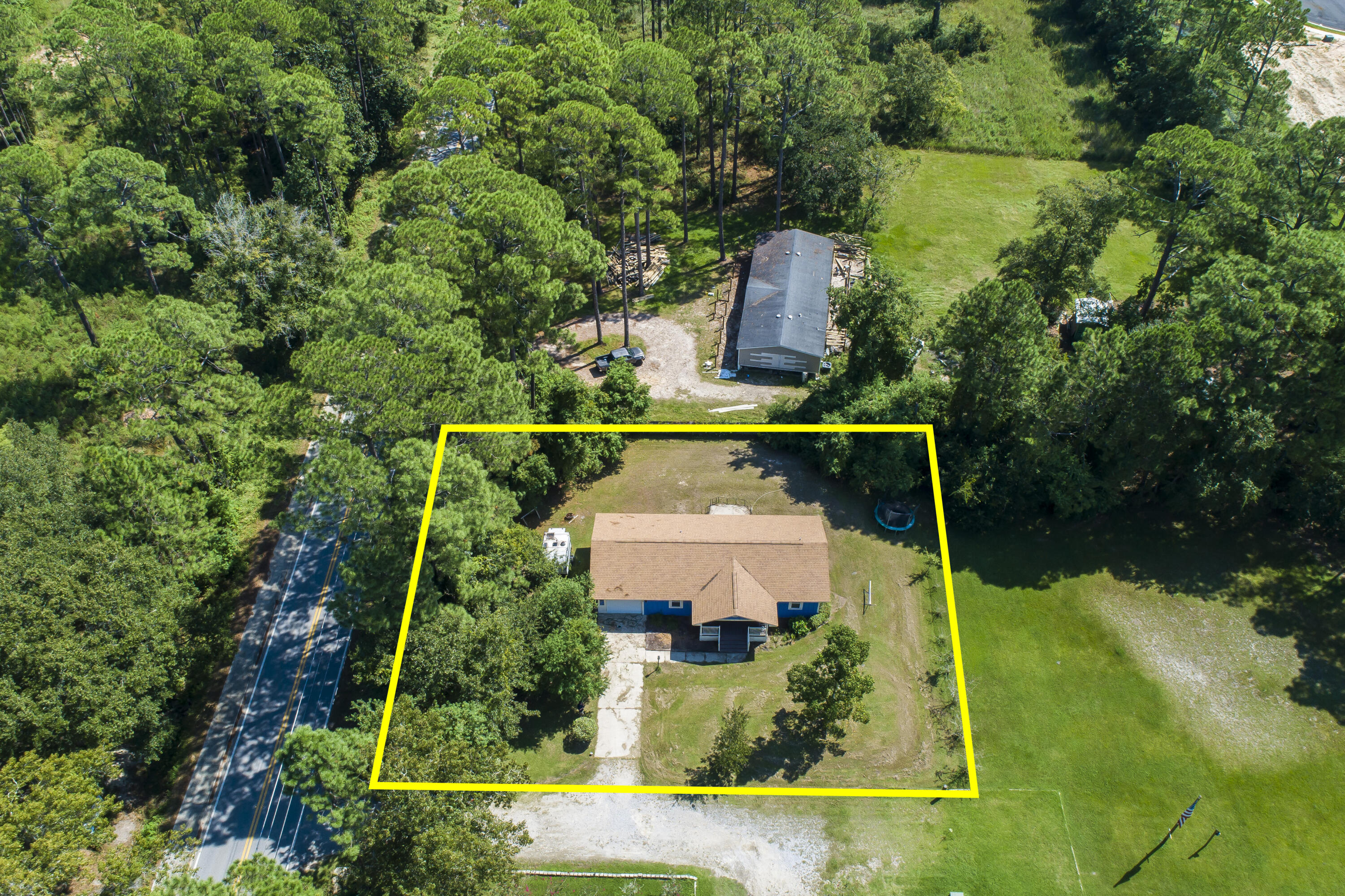 601 Chat Holley Road Santa Rosa Beach, FL 32459 - Photo 31 of 32 an aerial view of house with yard swimming pool and outdoor seating