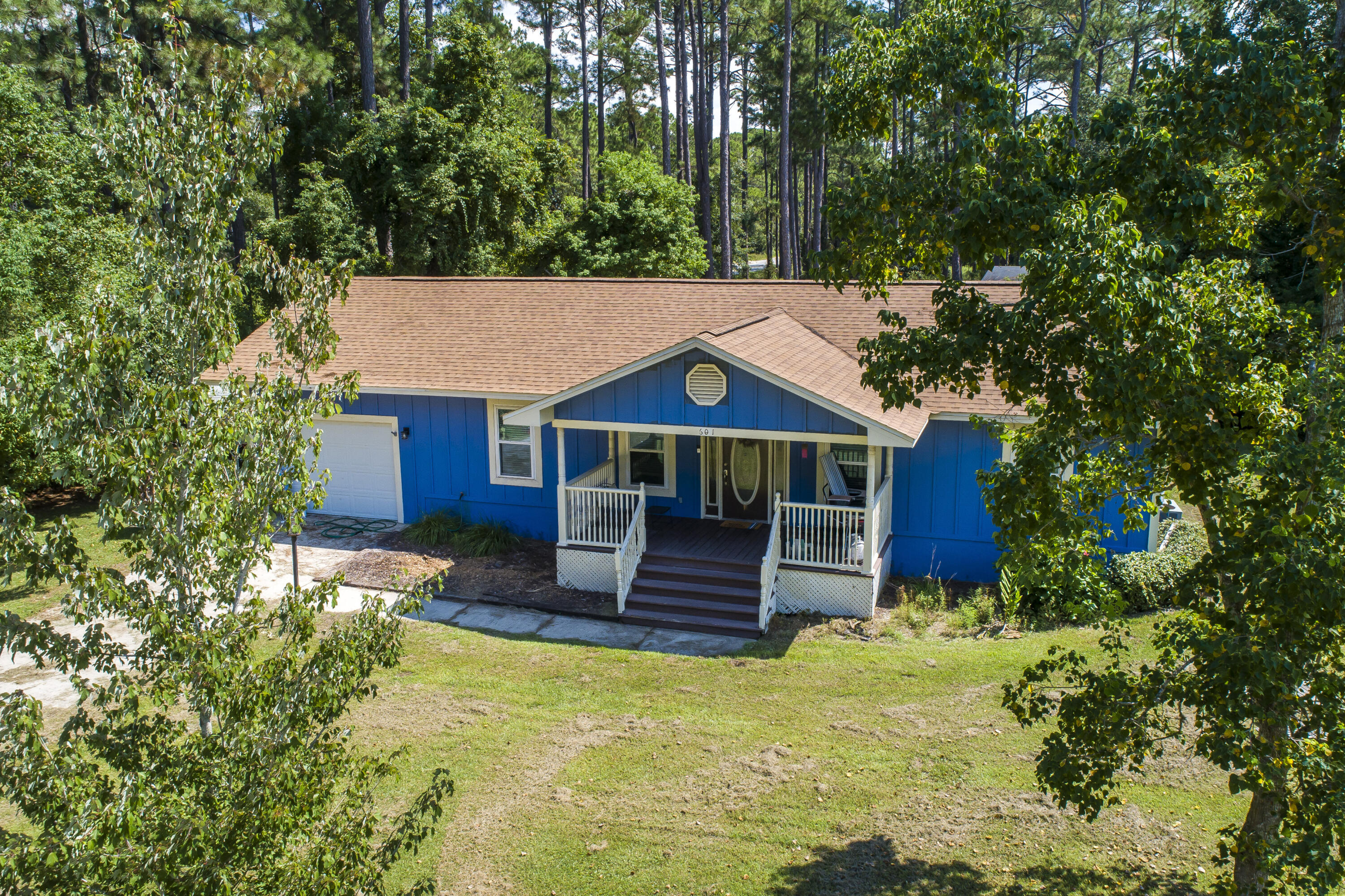601 Chat Holley Road Santa Rosa Beach, FL 32459 - Photo 32 of 32 a front view of a house with a yard