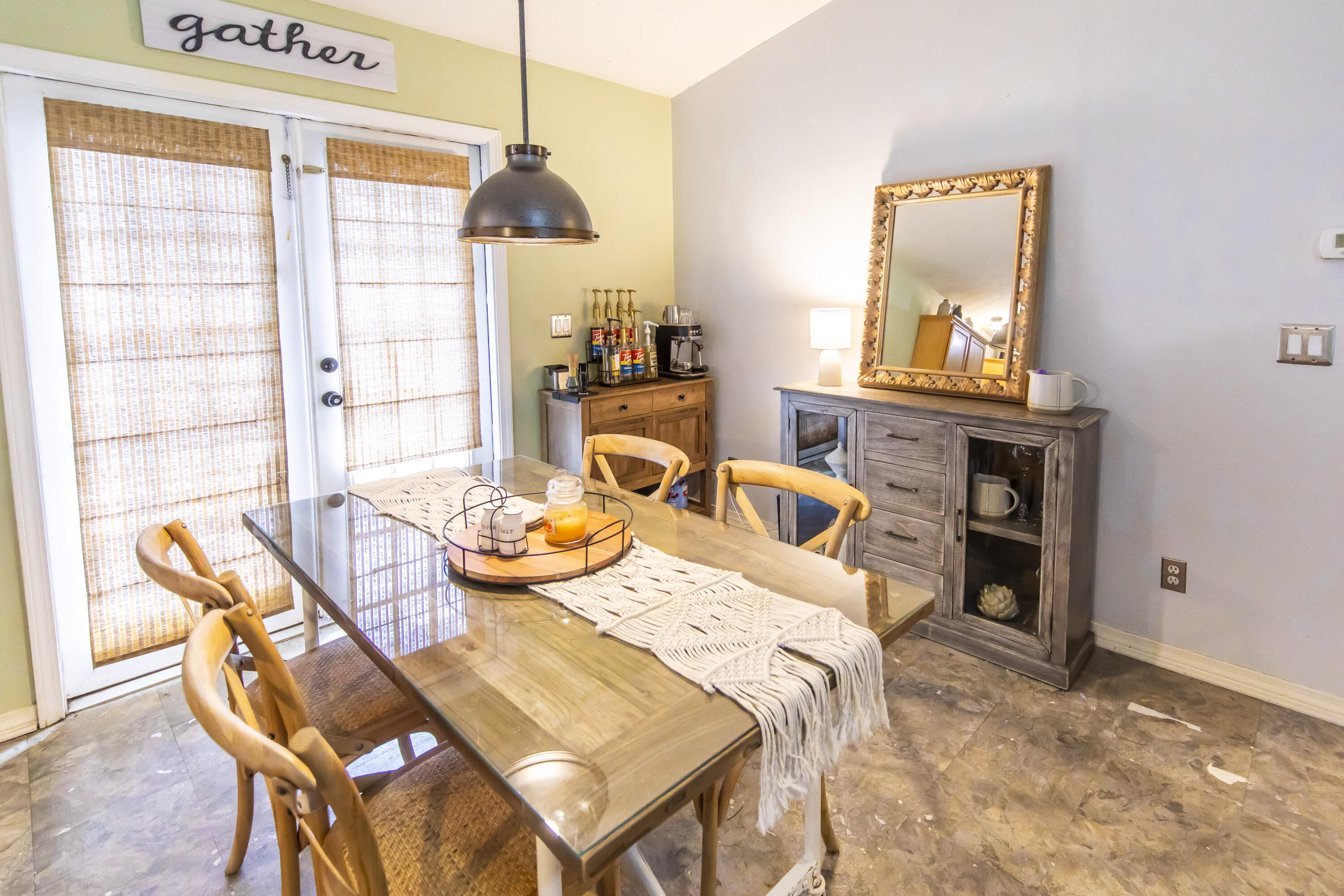 601 Chat Holley Road Santa Rosa Beach, FL 32459 - Photo 7 of 32 a view of a dining room with furniture a chandelier and wooden floor