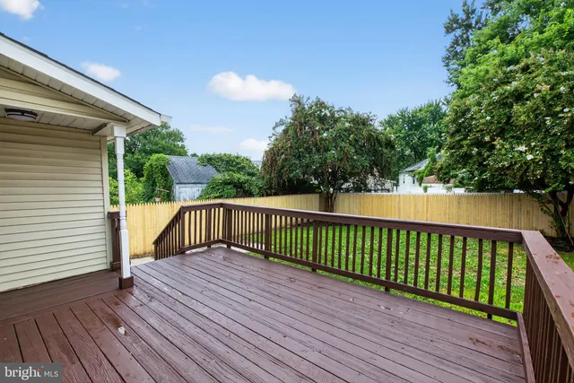 a view of balcony with wooden floor