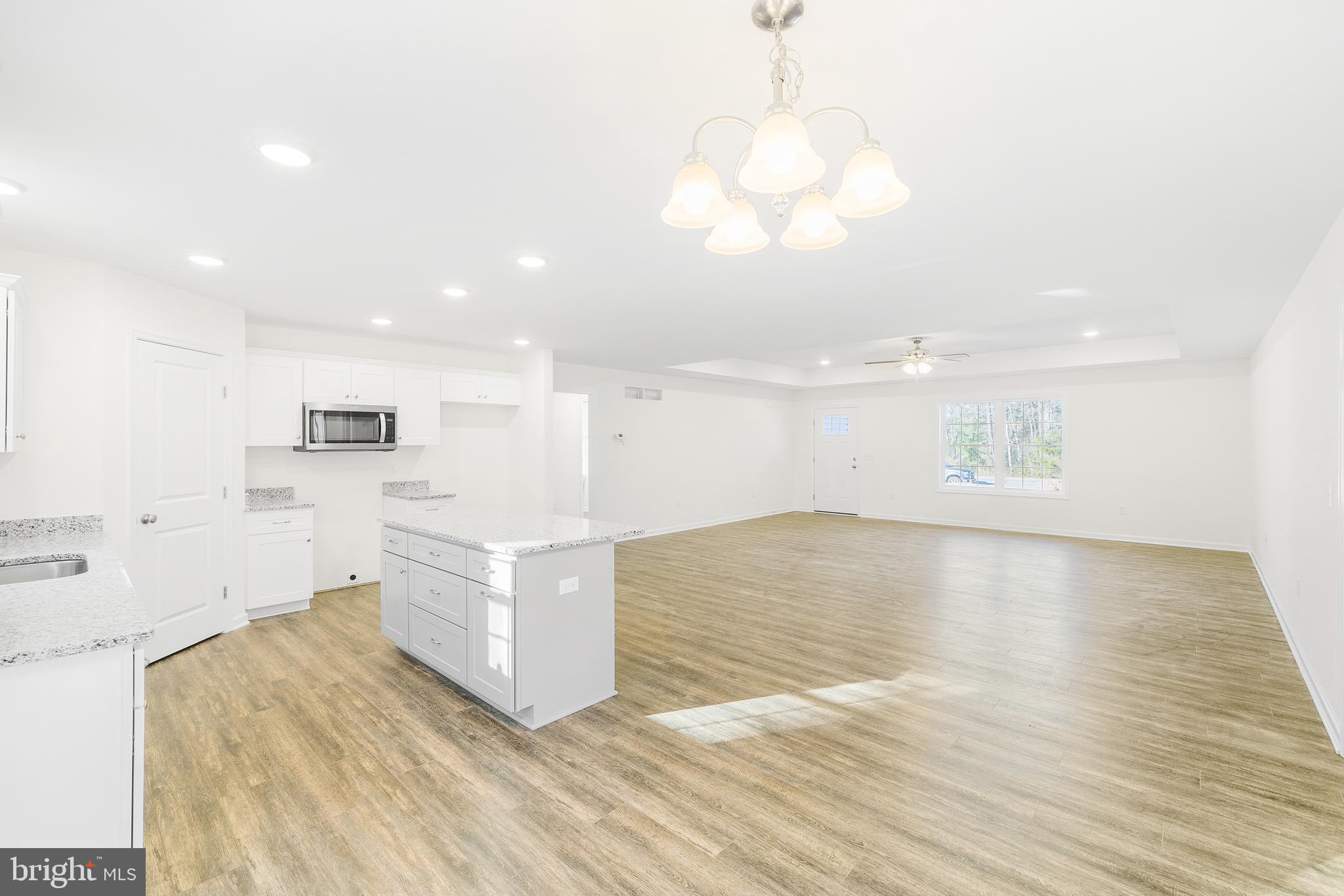 14895 Sand Hill Road Bridgeville, DE 19933 - Photo 3 of 14 Living room/dining room/kitchen