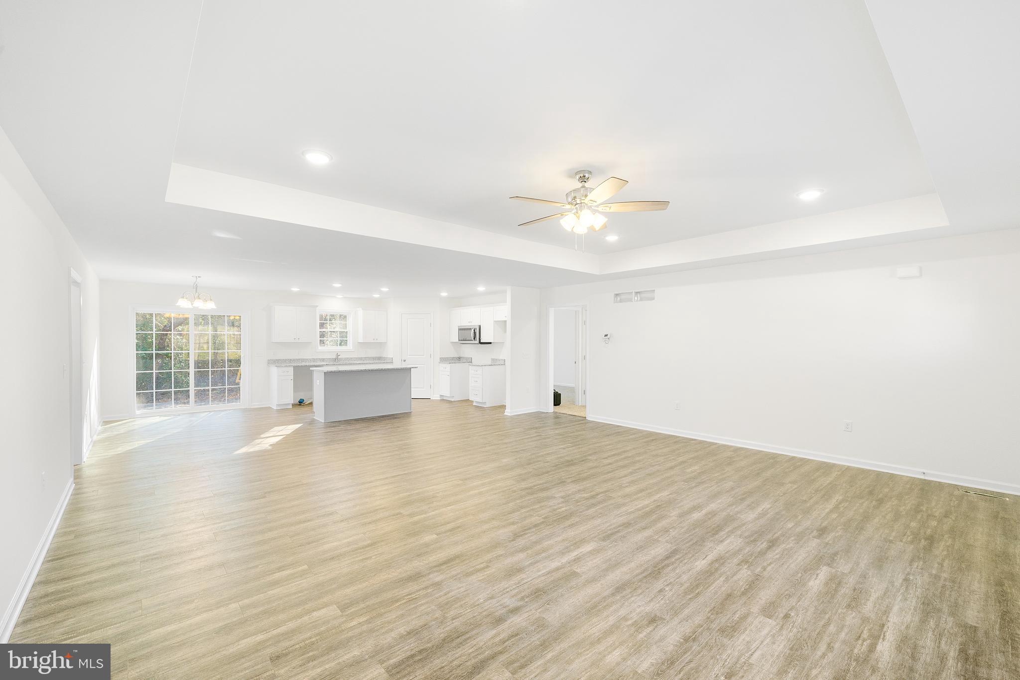 14895 Sand Hill Road Bridgeville, DE 19933 - Photo 4 of 14 Living room/dining room/kitchen