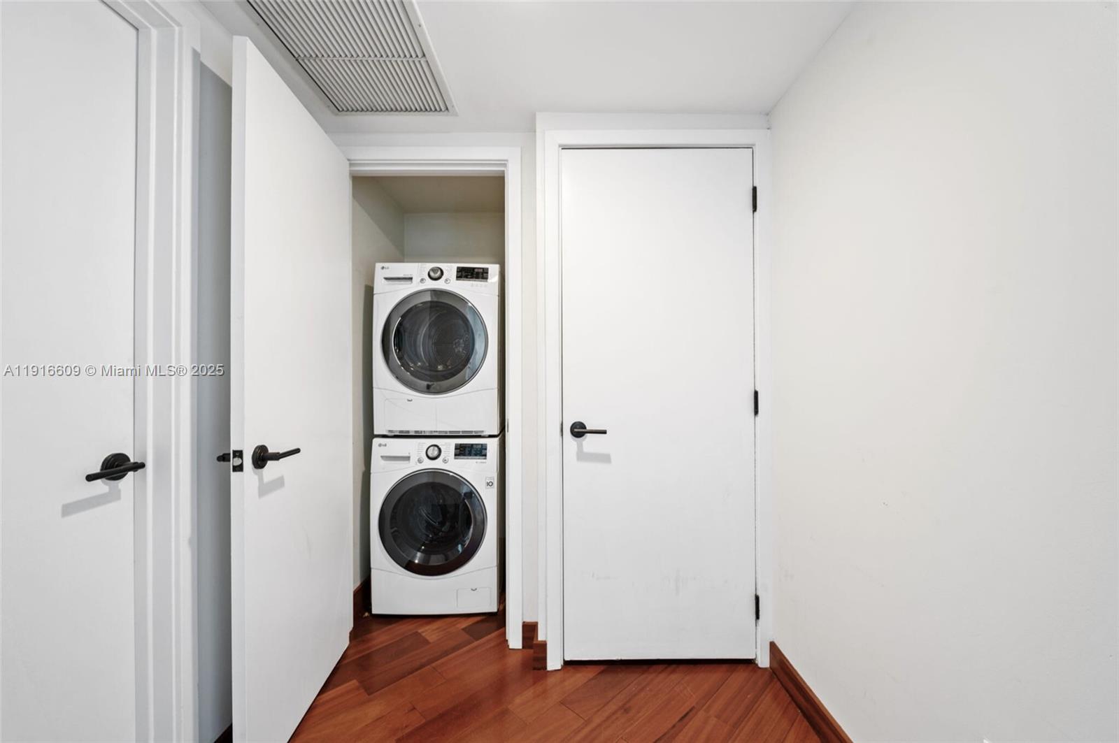 6801 Collins Avenue, Unit PH6 10) Miami Beach, FL 33141 - Photo 30 of 48 a small space with wooden floor and a sink