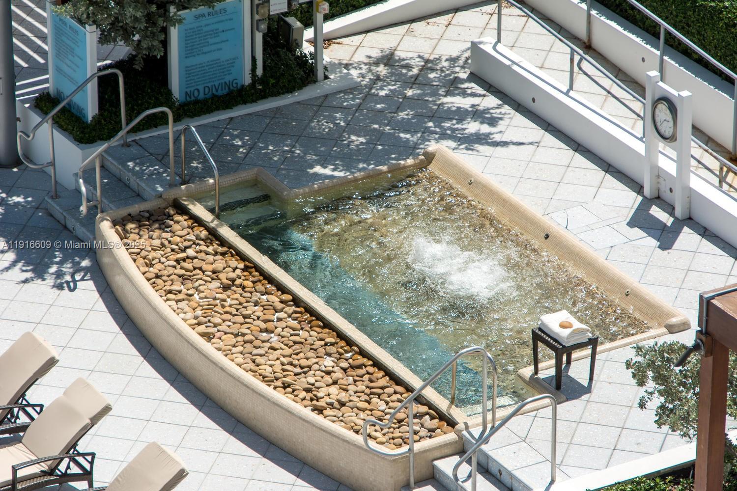 6801 Collins Avenue, Unit PH6 10) Miami Beach, FL 33141 - Photo 41 of 48 a view of balcony with wooden floor