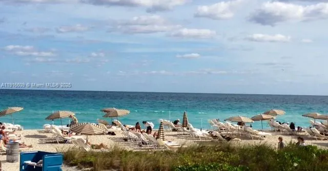 a view of a lobby with black carpet