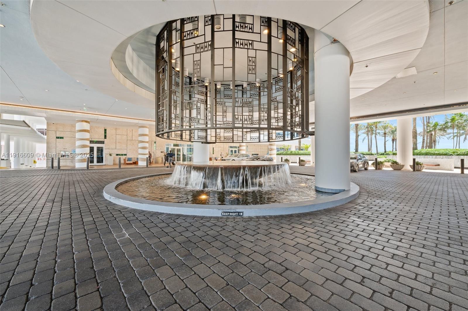 6801 Collins Avenue, Unit PH6 10) Miami Beach, FL 33141 - Photo 47 of 48 a view of a living room and bathroom