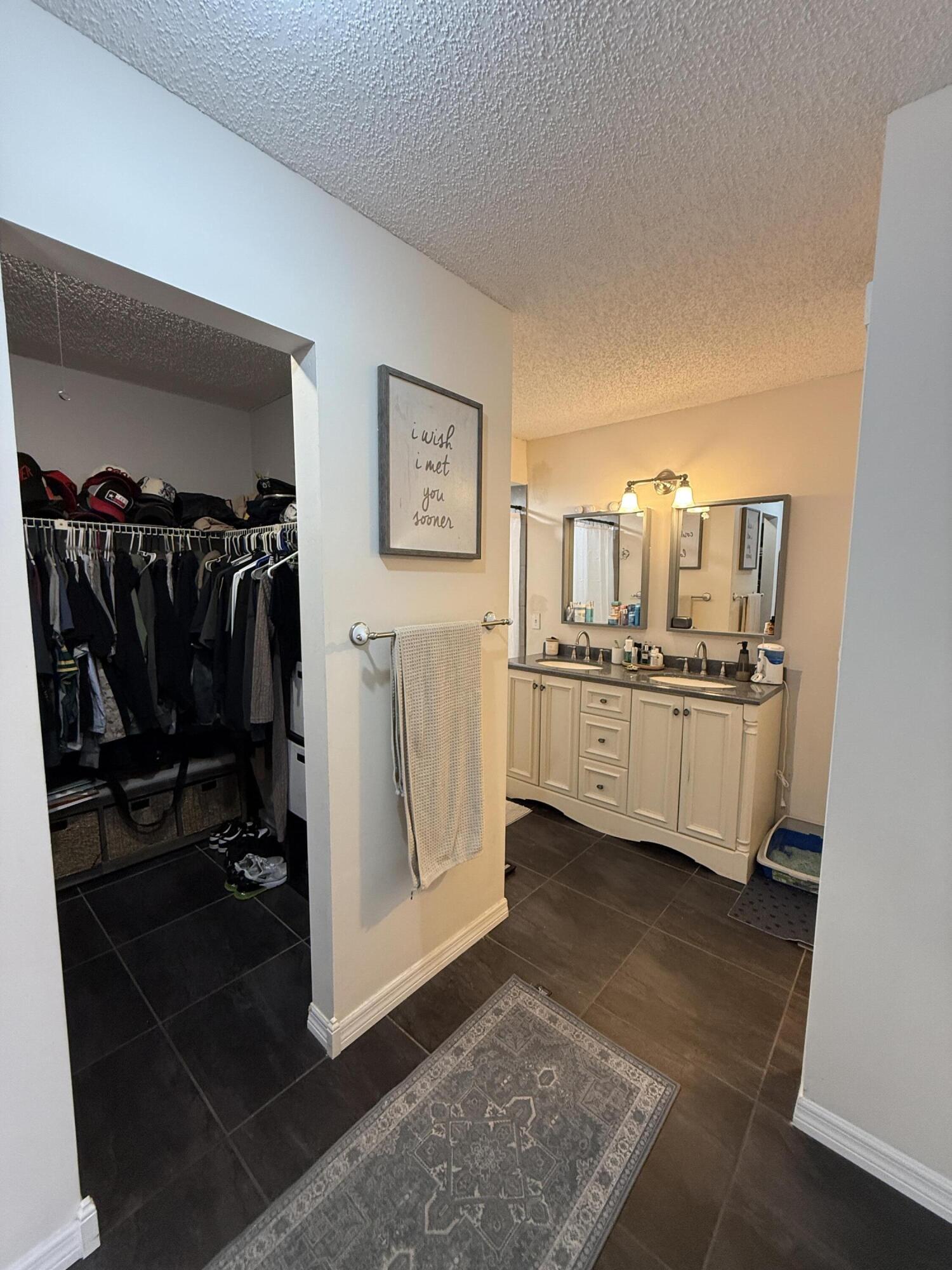 1021 Springdale Circle Palm Springs, FL 33461 - Photo 13 of 32 13 - Master Suite Closets & Bath