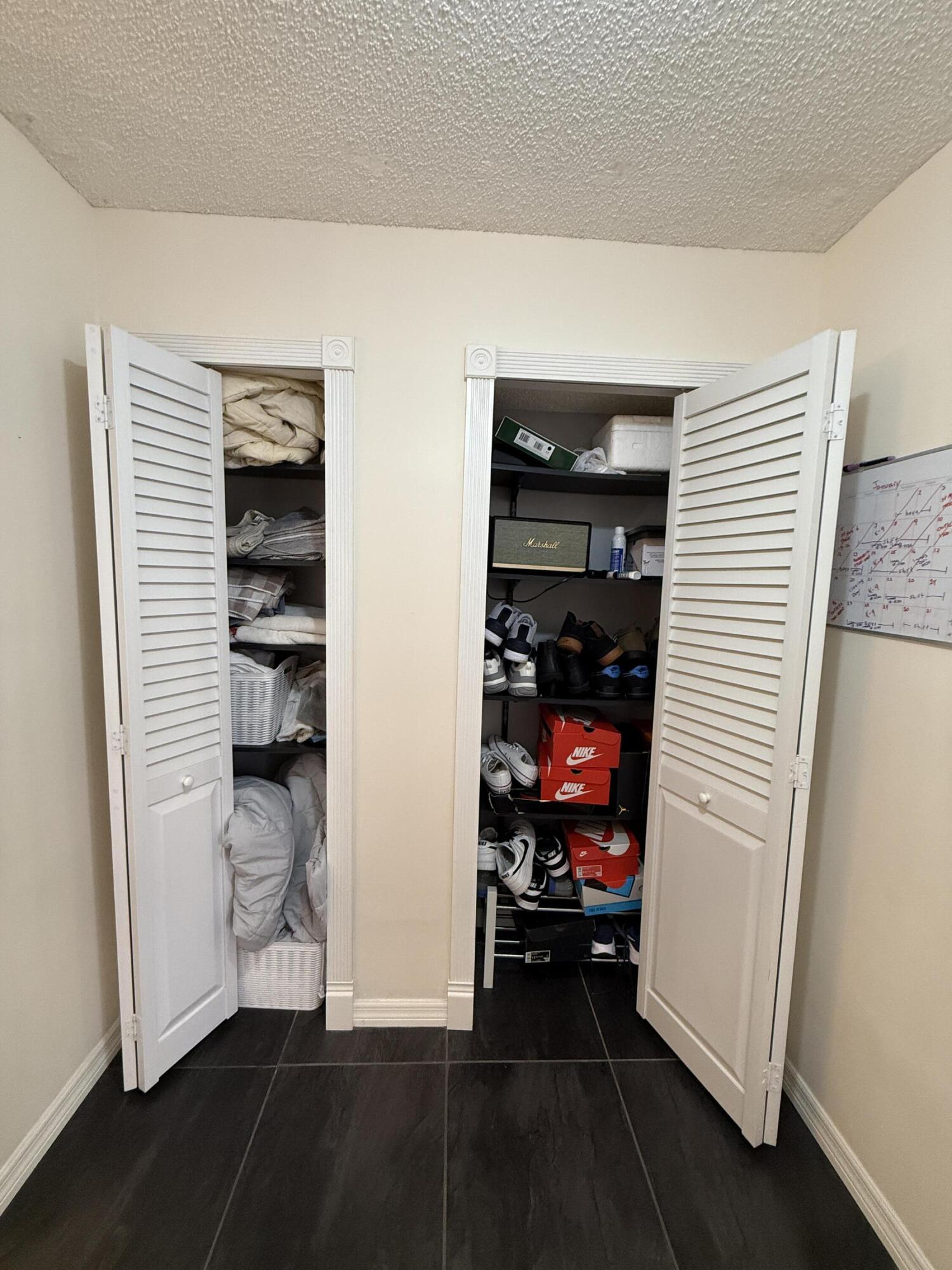 1021 Springdale Circle Palm Springs, FL 33461 - Photo 14 of 32 14 - Master Suite Closets 2 & 3