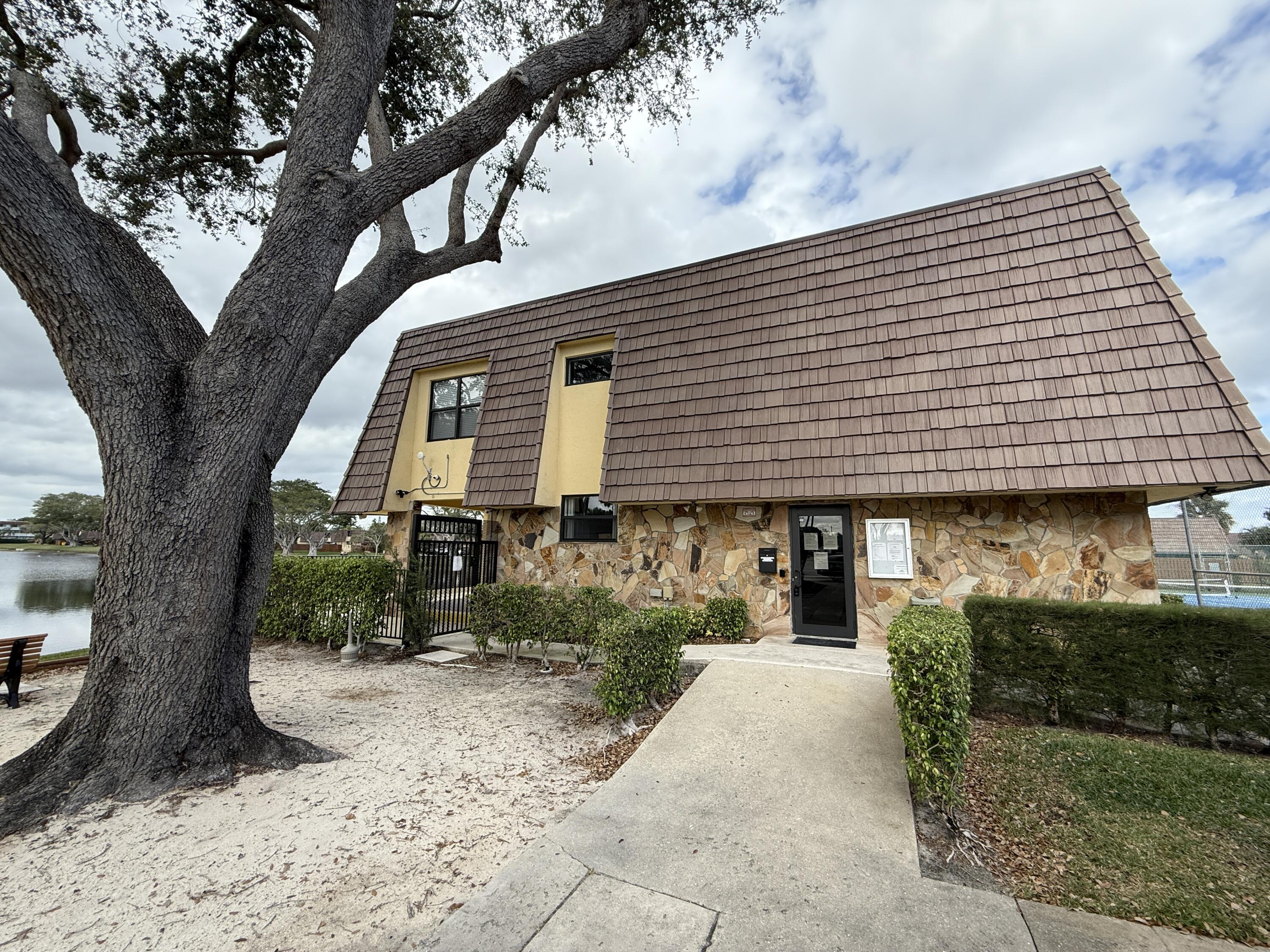 1021 Springdale Circle Palm Springs, FL 33461 - Photo 26 of 32 26 - Clubhouse