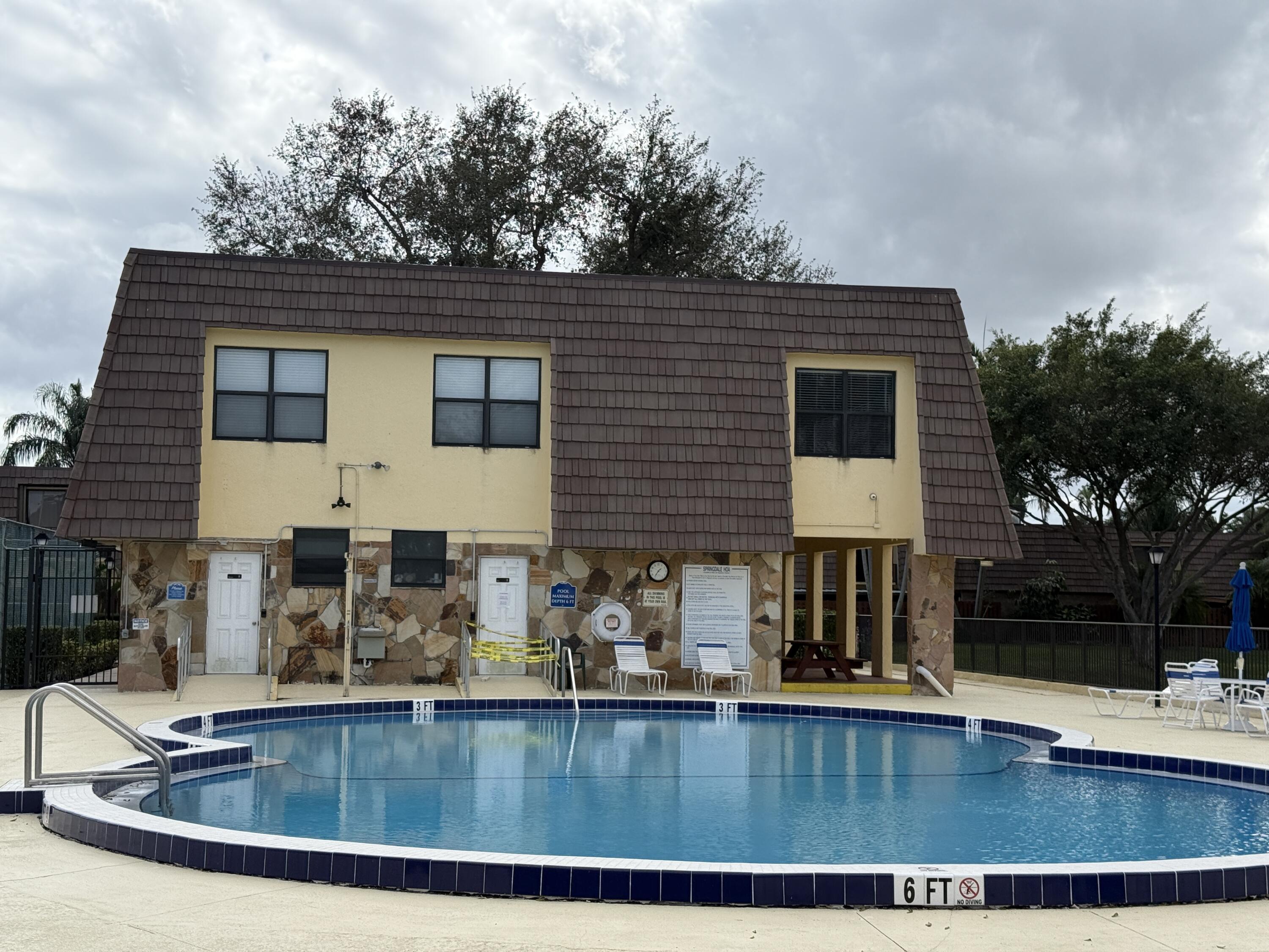 1021 Springdale Circle Palm Springs, FL 33461 - Photo 28 of 32 28 - Clubhouse Pool
