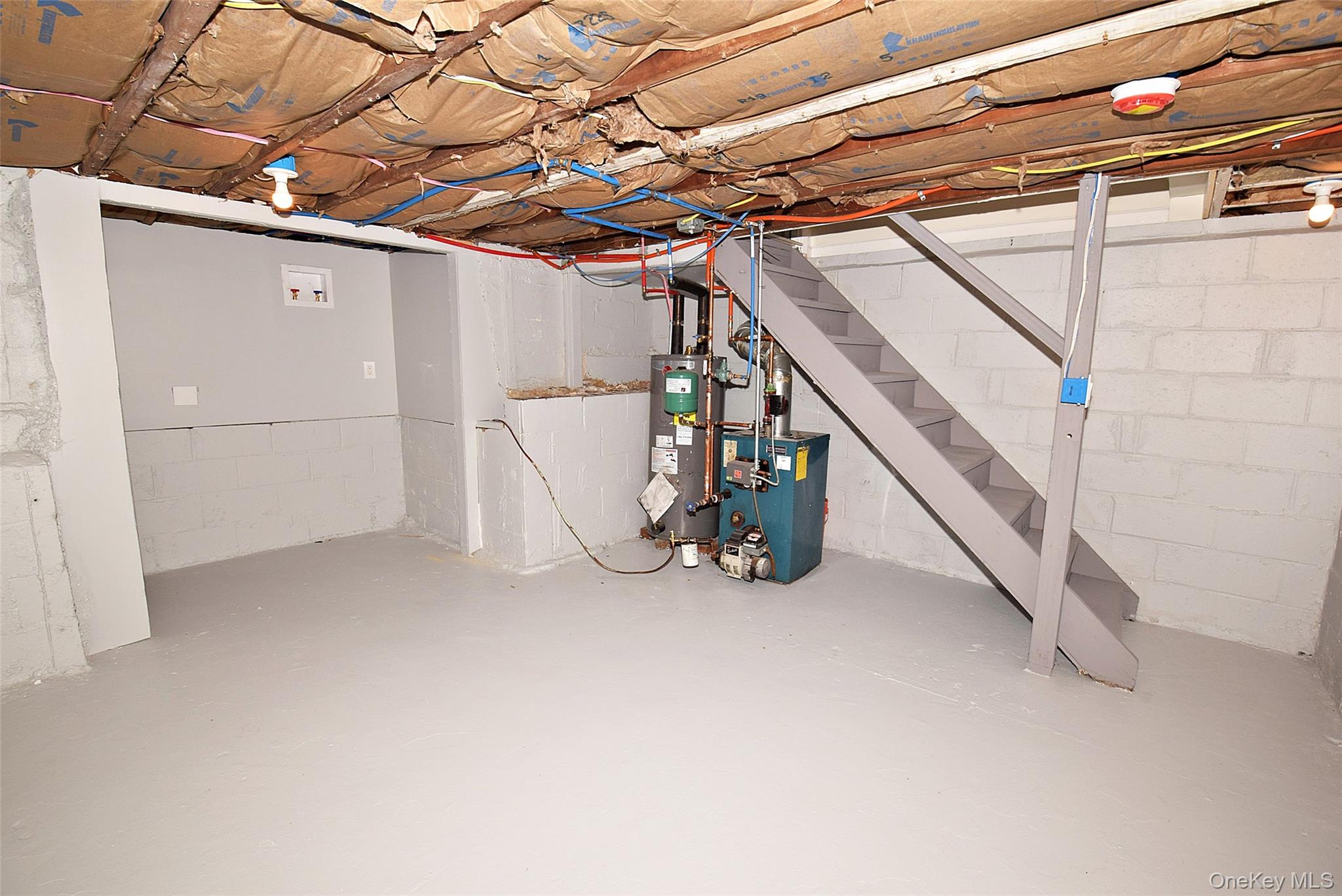 371 Oceanside Street Islip Terrace, NY 11752 - Photo 32 of 38 a view of an empty room with stairs