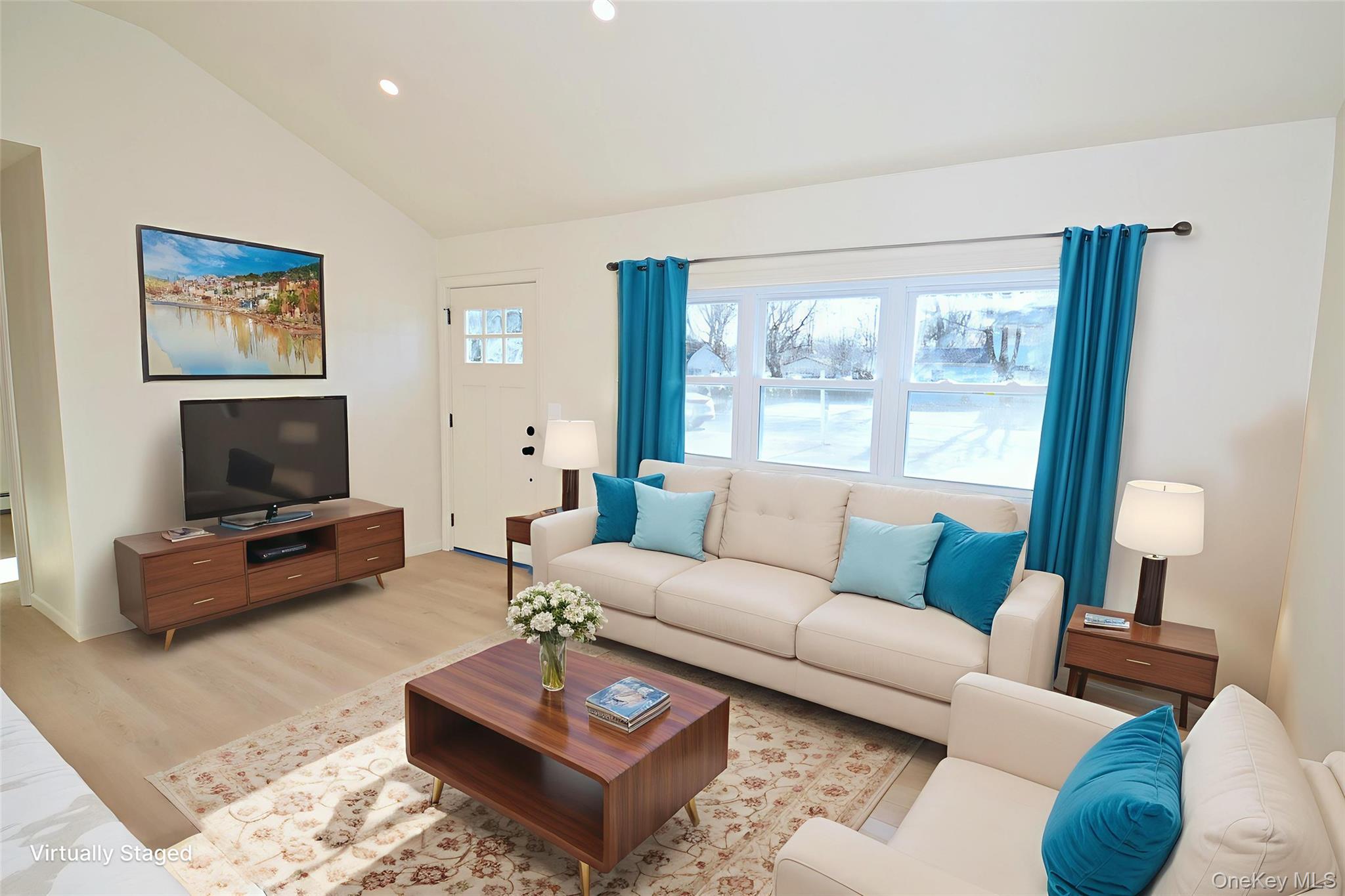 371 Oceanside Street Islip Terrace, NY 11752 - Photo 5 of 38 a living room with furniture a rug a window and a flat screen tv