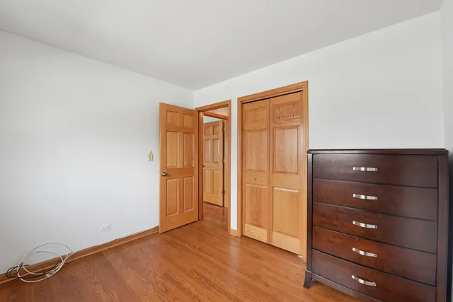 a view of room with hardwood floor