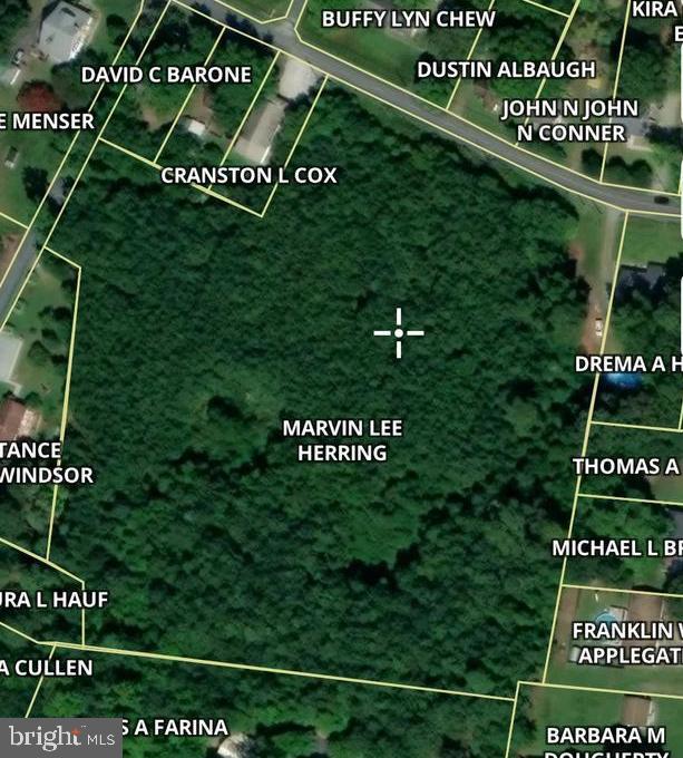 Mariners Road Crisfield, MD 21817 - Photo 1 of 1 a sign on a street sign