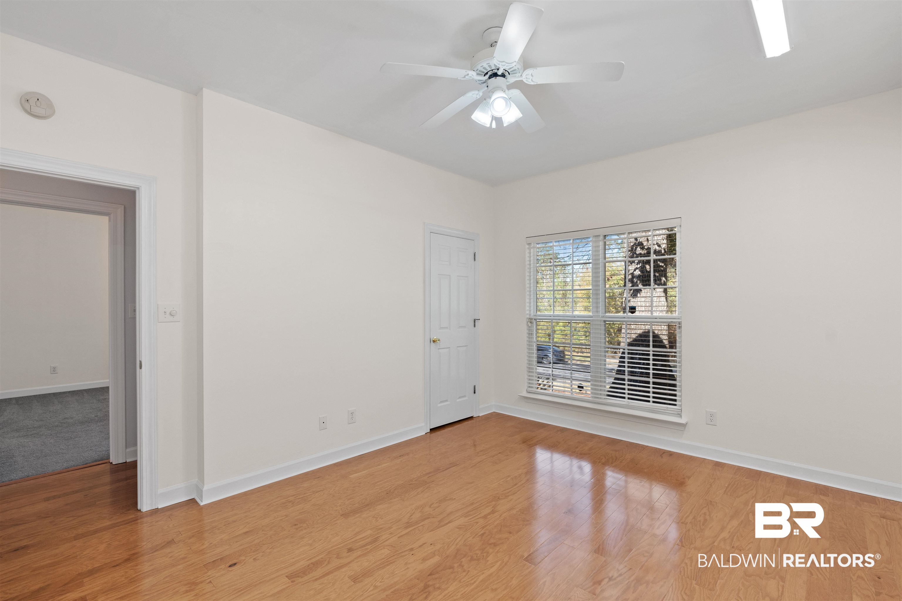 4 Judd Trail Daphne, AL 36527 - Photo 36 of 45 Empty room with a ceiling fan, light wood-style floors, and baseboards