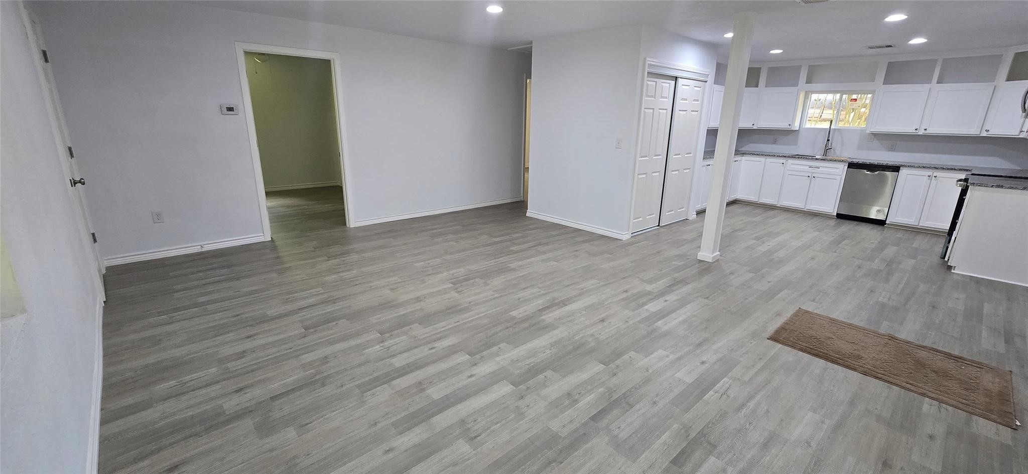 110 Hidden Circle Coldspring, TX 77331 - Photo 3 of 24 Spacious lingroom with open concept to kitchen
