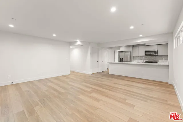 a view of a kitchen with a sink