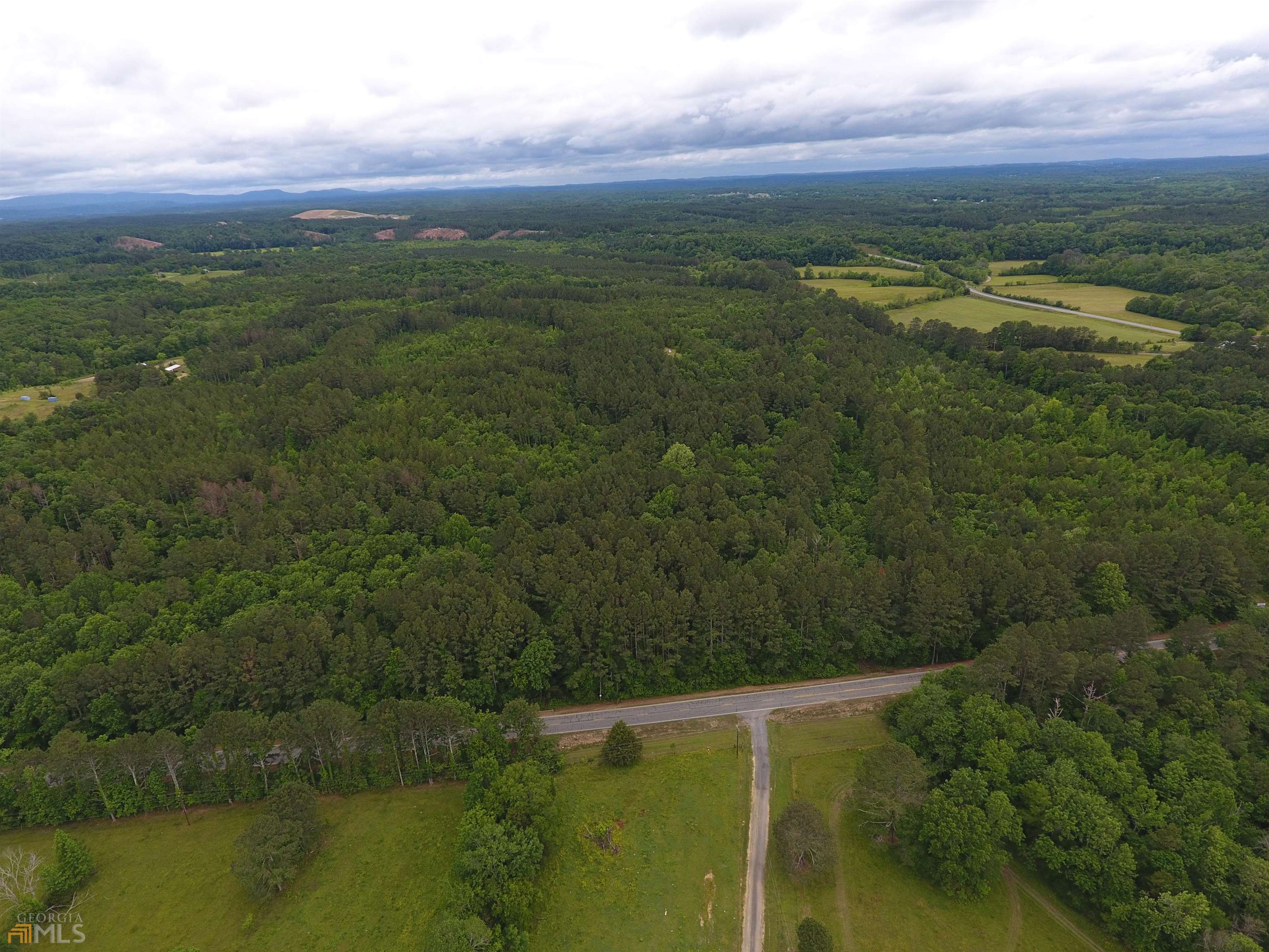 0 Lick Creek Road Northeast, Unit 9624C Ranger, GA 30734 - Photo 8 of 19 a view of a lake with a city