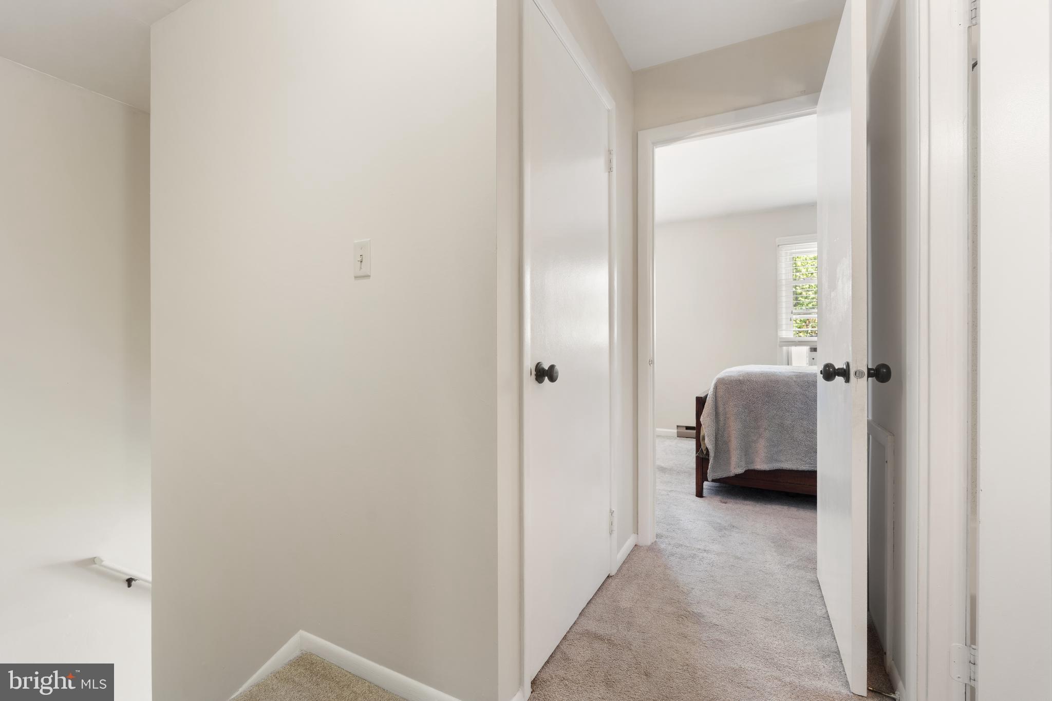 18 Wenner Drive Brunswick, MD 21716 - Photo 12 of 30 a view of a bedroom from a hallway
