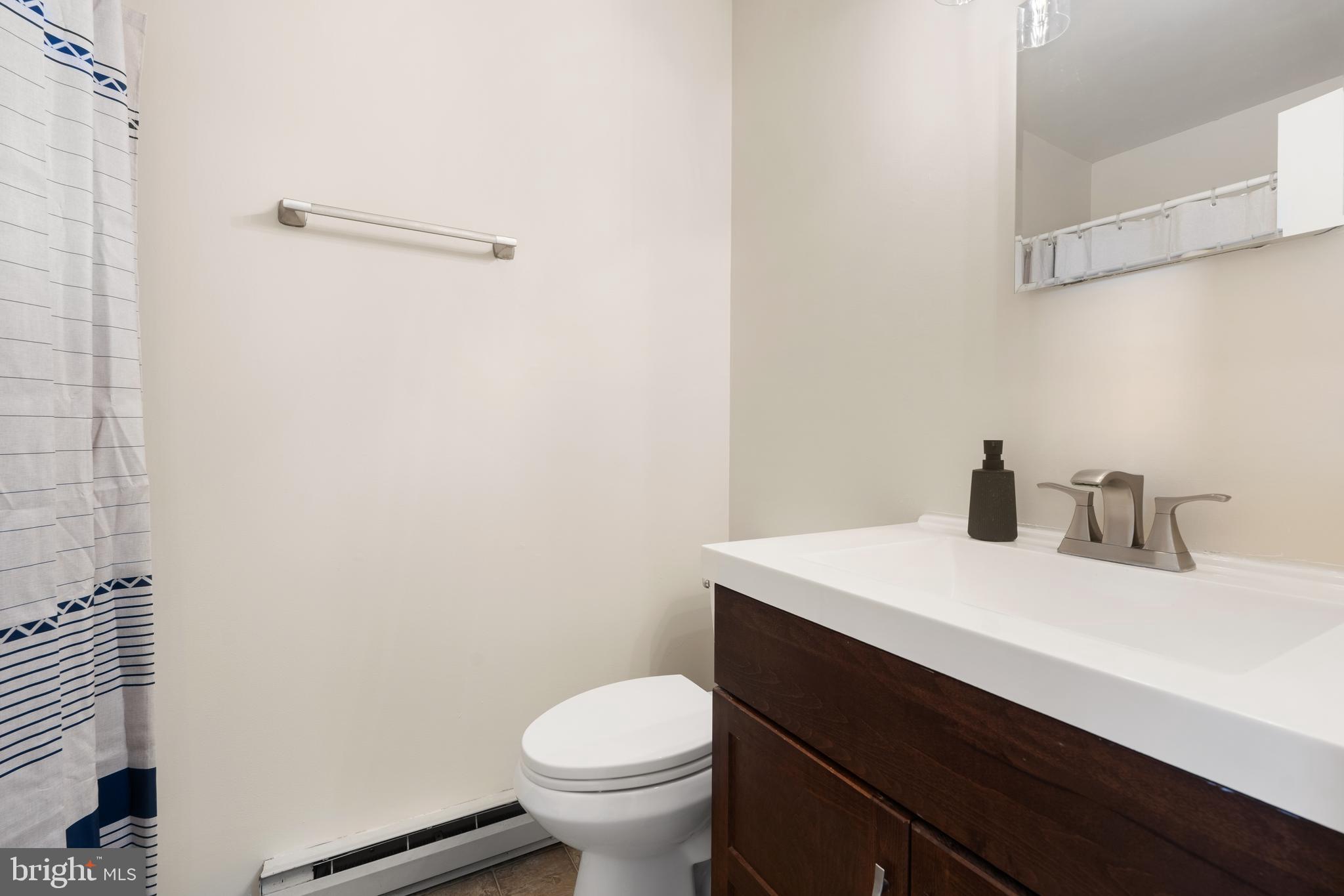 18 Wenner Drive Brunswick, MD 21716 - Photo 15 of 30 a bathroom with a sink toilet and vanity