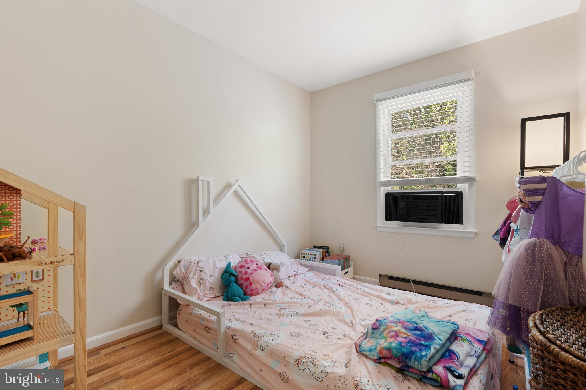 18 Wenner Drive Brunswick, MD 21716 - Photo 17 of 30 a bedroom with a bed and wooden floor