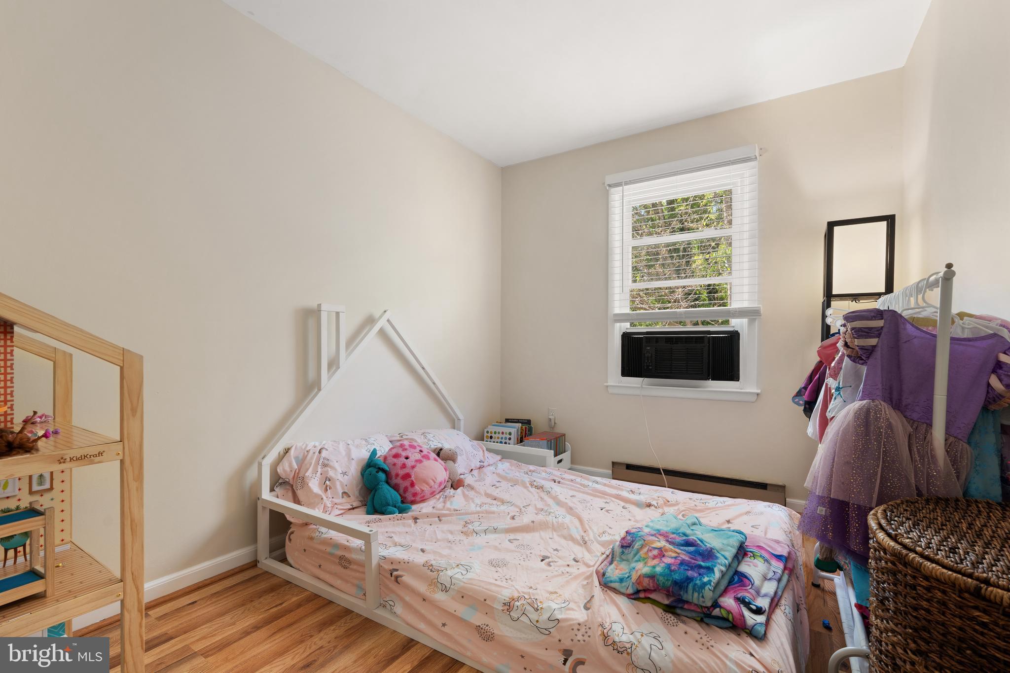 18 Wenner Drive Brunswick, MD 21716 - Photo 18 of 30 a bedroom with a bed and wooden floor