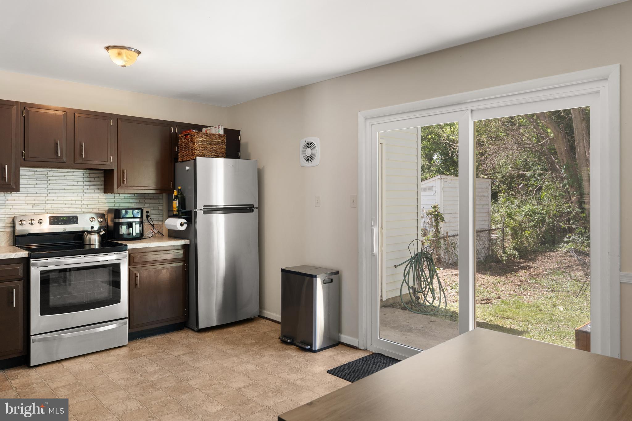 18 Wenner Drive Brunswick, MD 21716 - Photo 9 of 30 a kitchen with stainless steel appliances a refrigerator and a sink