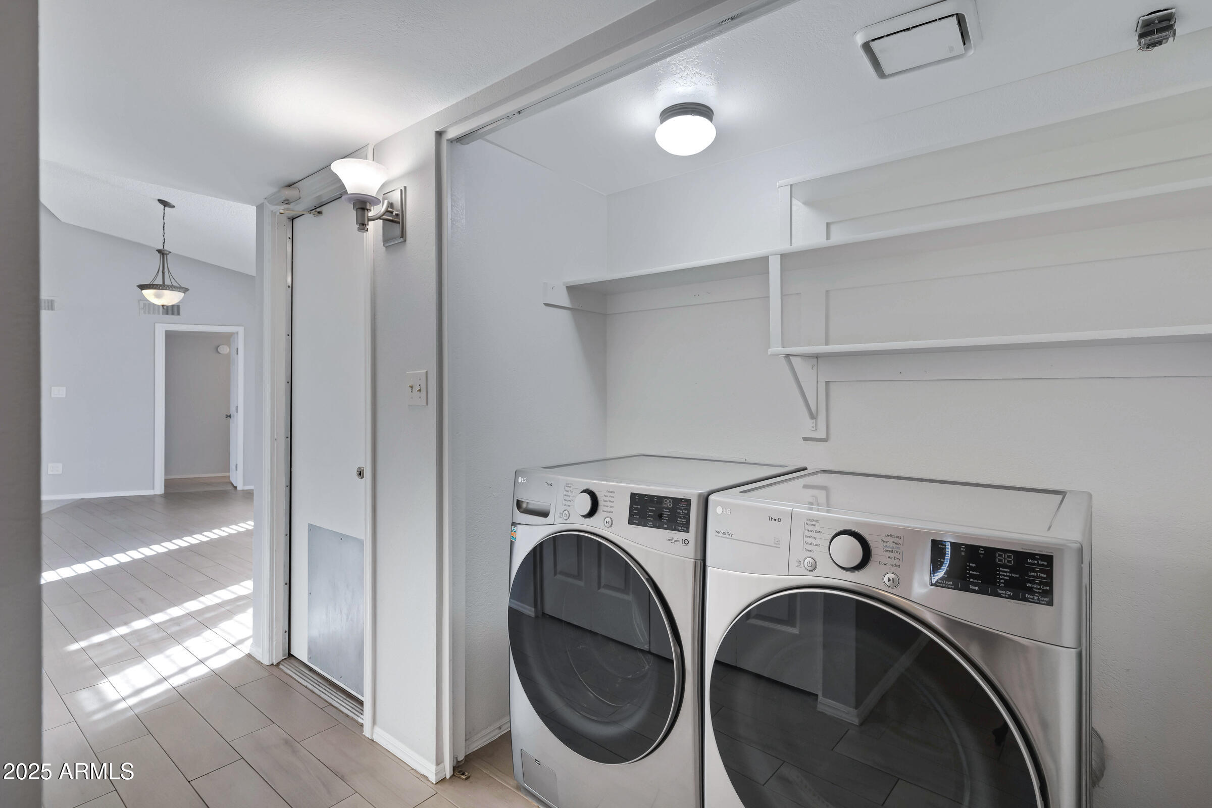 792 West El Monte Place, Unit 8 Chandler, AZ 85225 - Photo 19 of 33 a utility room with dryer and washer