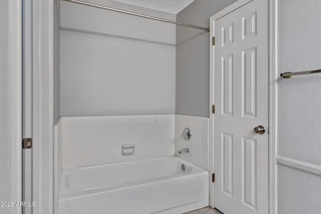 a bathroom with a bathtub