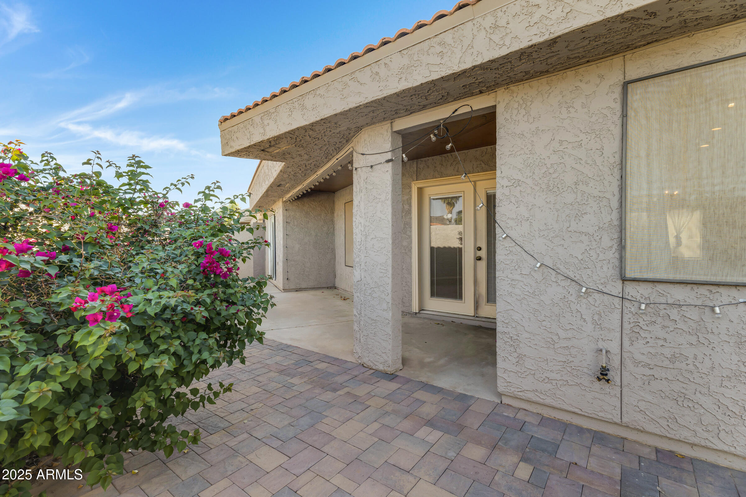 792 West El Monte Place, Unit 8 Chandler, AZ 85225 - Photo 30 of 33 a front view of a house with entryway